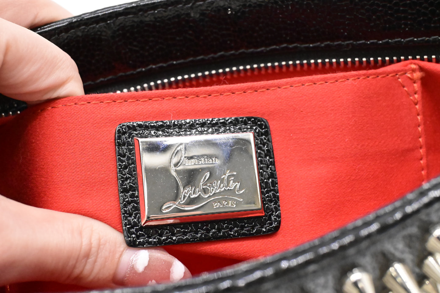 Louboutin Loubiposh Clutch in Black Spiked Leather