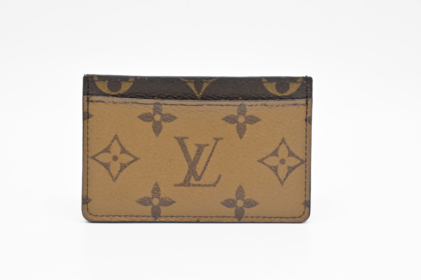 Louis Vuitton Card Case in Reverse Monogram Canvas