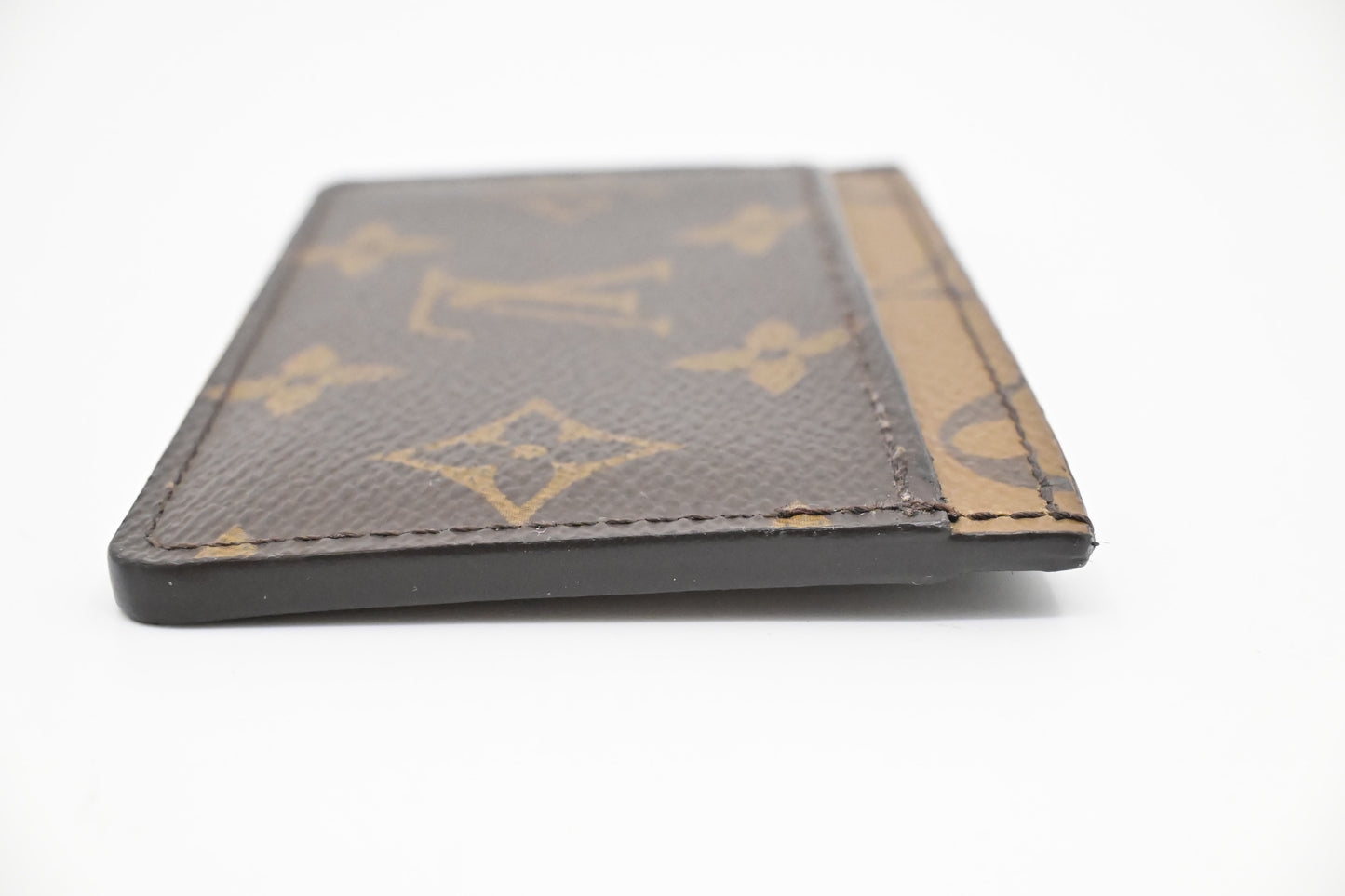 Louis Vuitton Card Case in Reverse Monogram Canvas