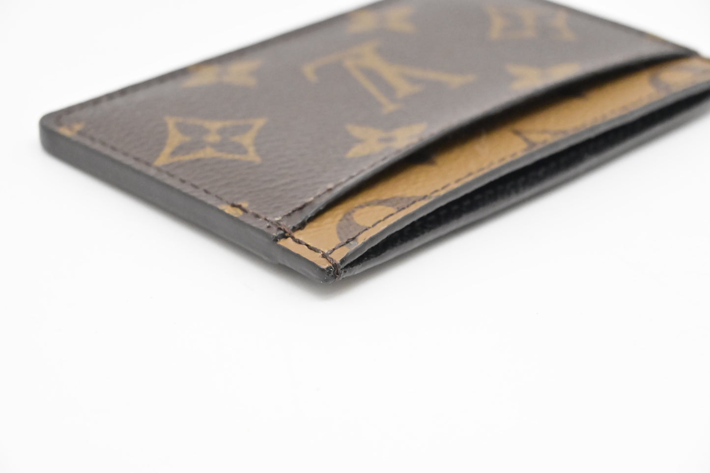 Louis Vuitton Card Case in Reverse Monogram Canvas