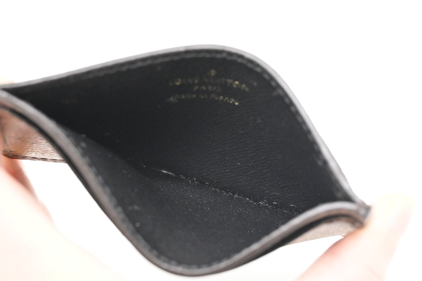 Louis Vuitton Card Case in Reverse Monogram Canvas