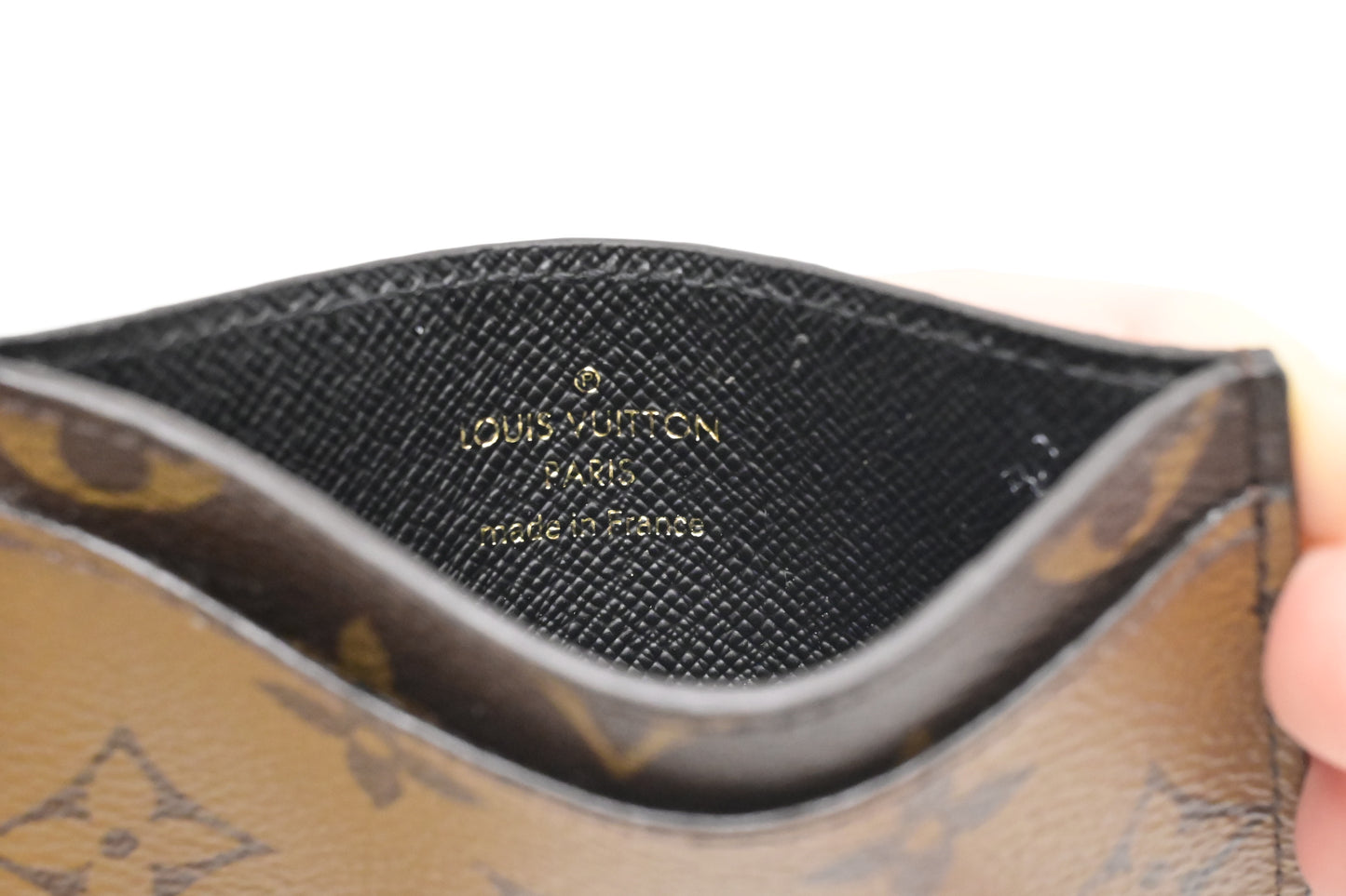 Louis Vuitton Card Case in Reverse Monogram Canvas
