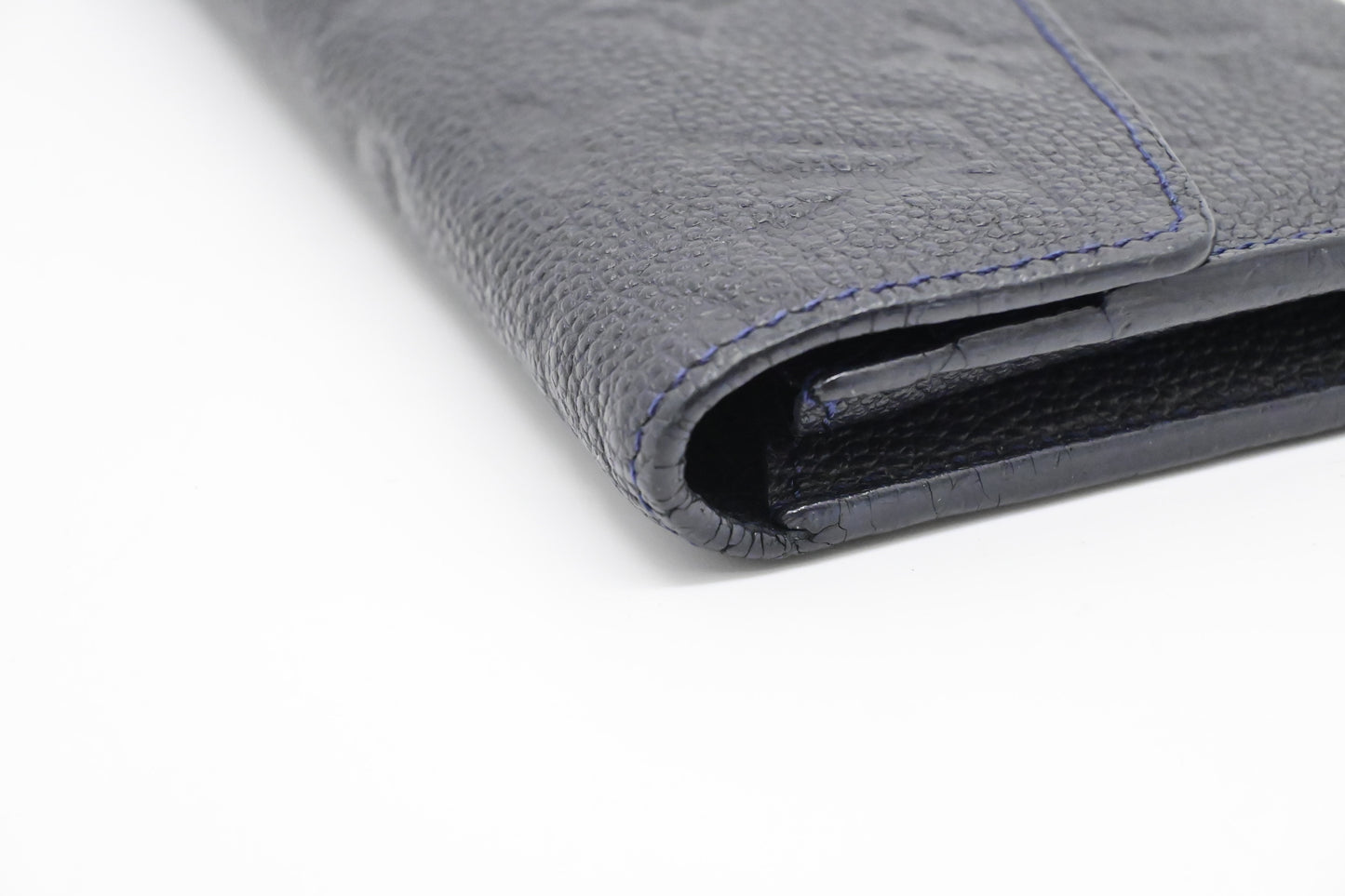 Louis Vuitton Curieuse Wallet in Bleu Infini Empreinte Leather