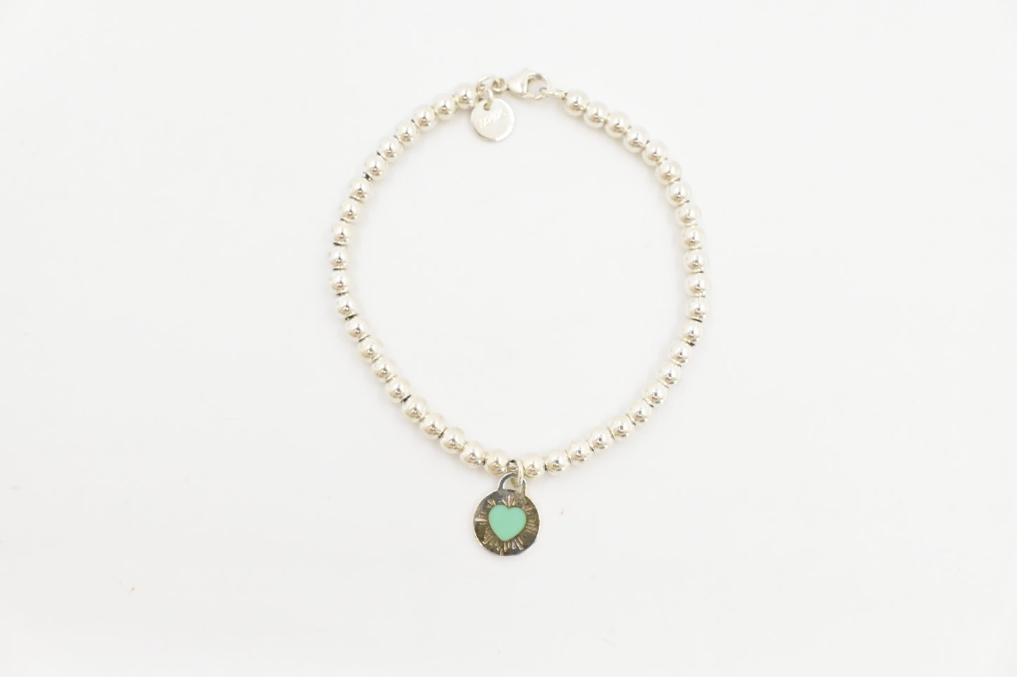 Tiffany & Co. Round Heart Charm Bracelet in Sterling Silver