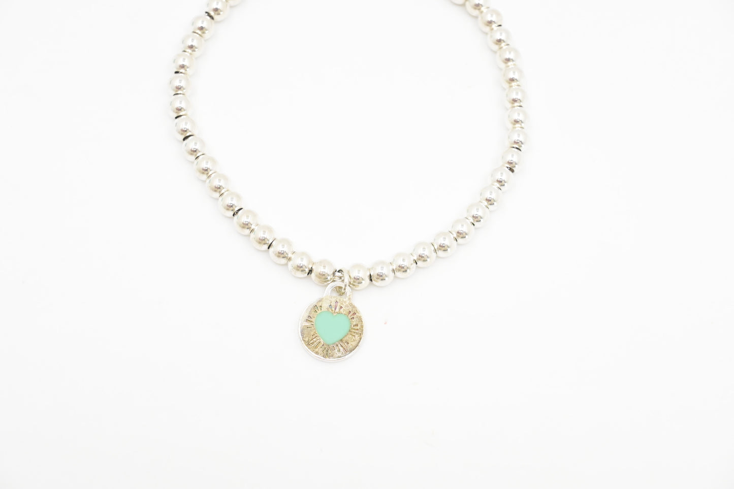 Tiffany & Co. Round Heart Charm Bracelet in Sterling Silver