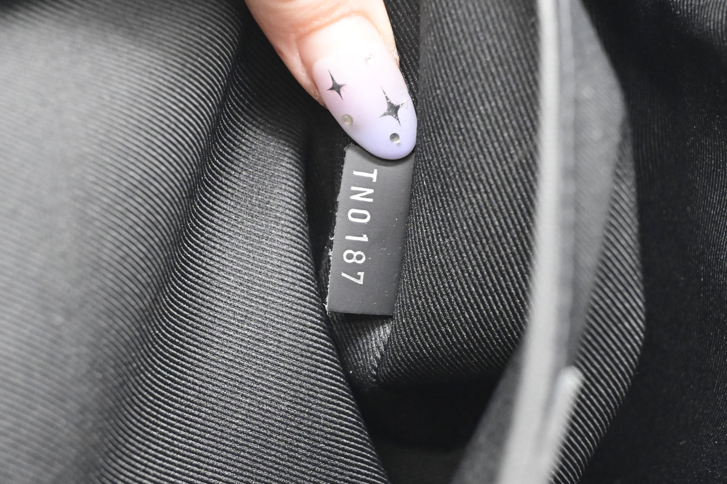 Louis Vuitton Pochette Discovery in Monogram Eclipse Canvas