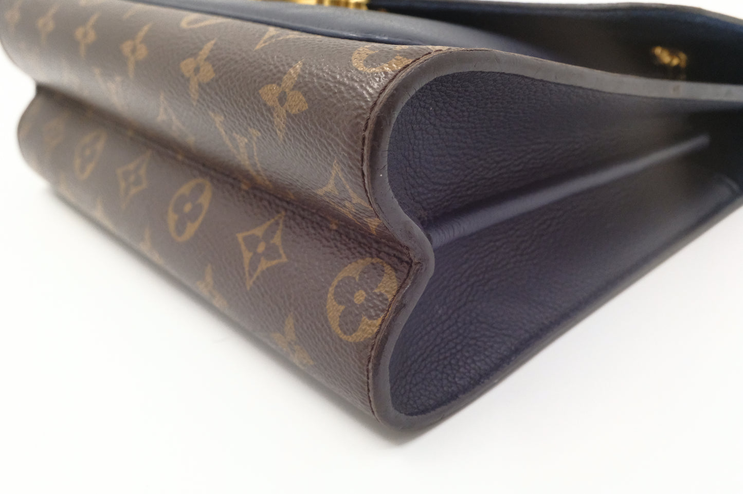 Louis Vuitton Victoire in Monogram Canvas & Blue Leather