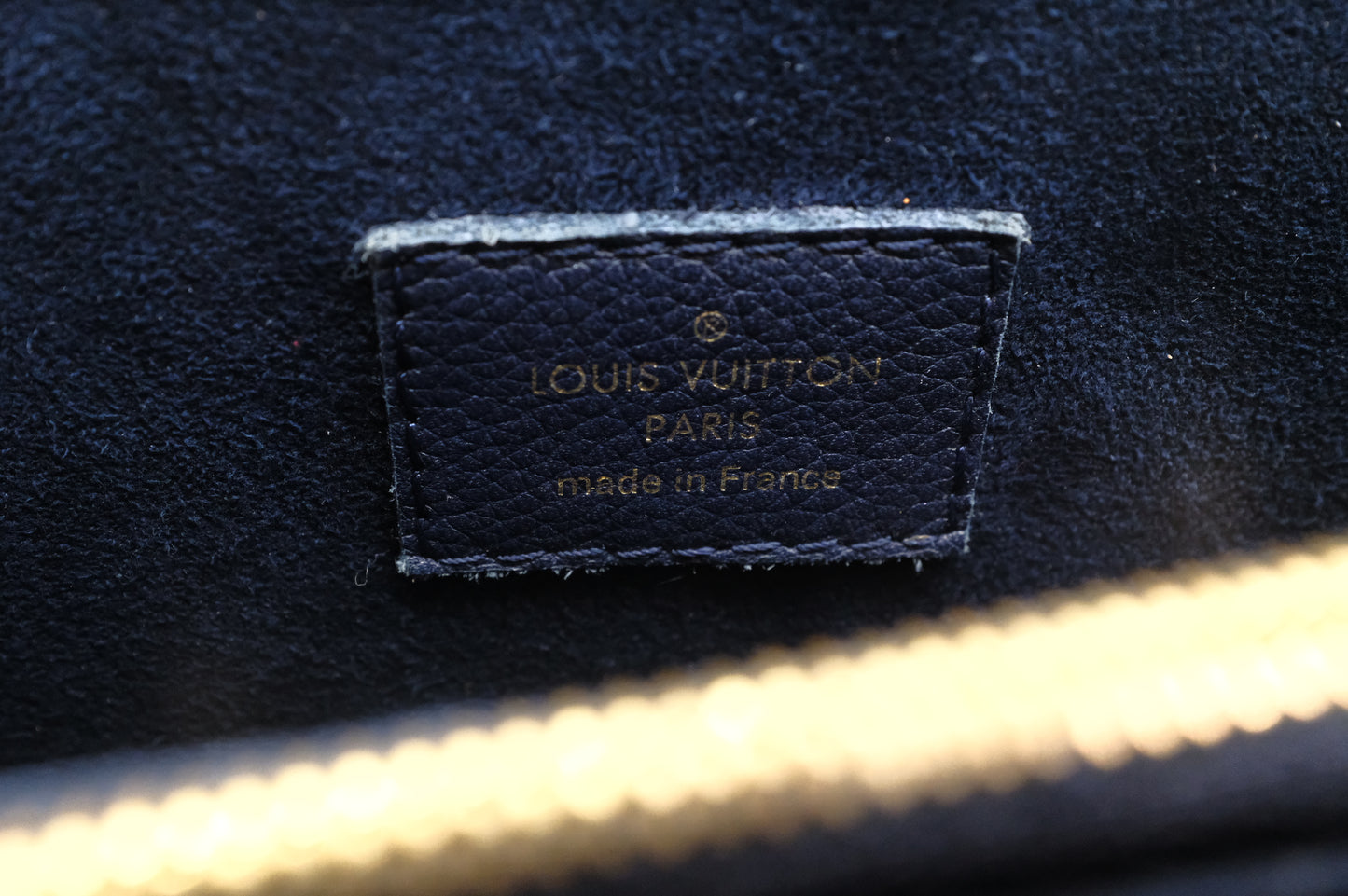 Louis Vuitton Victoire in Monogram Canvas & Blue Leather