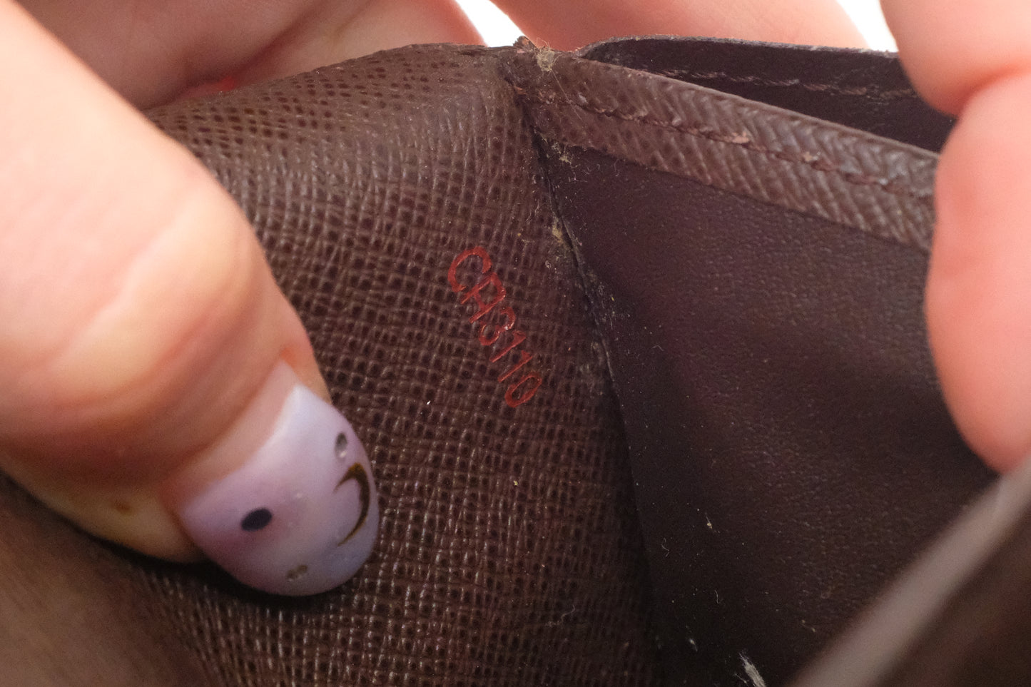 Louis Vuitton Sarah Wallet in Damier Ebene Canvas