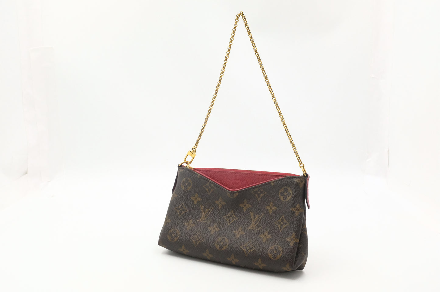 Louis Vuitton Pallas Clutch in Monogram Canvas and Red Leather