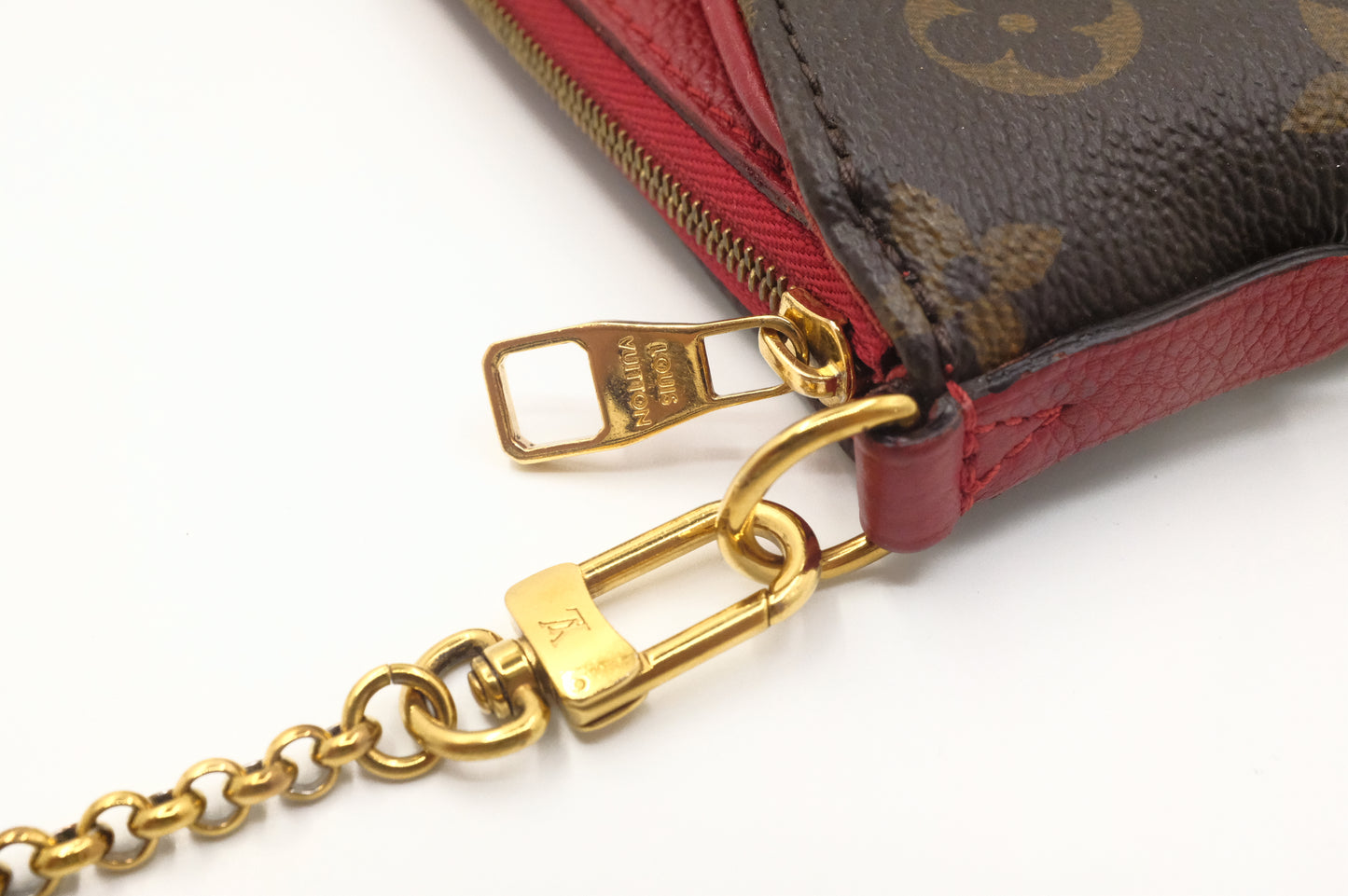 Louis Vuitton Pallas Clutch in Monogram Canvas and Red Leather