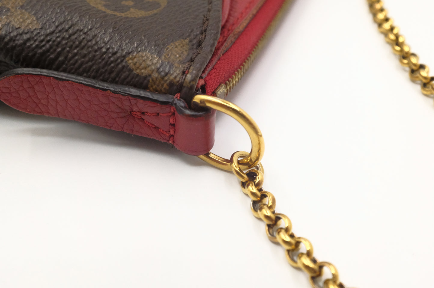 Louis Vuitton Pallas Clutch in Monogram Canvas and Red Leather