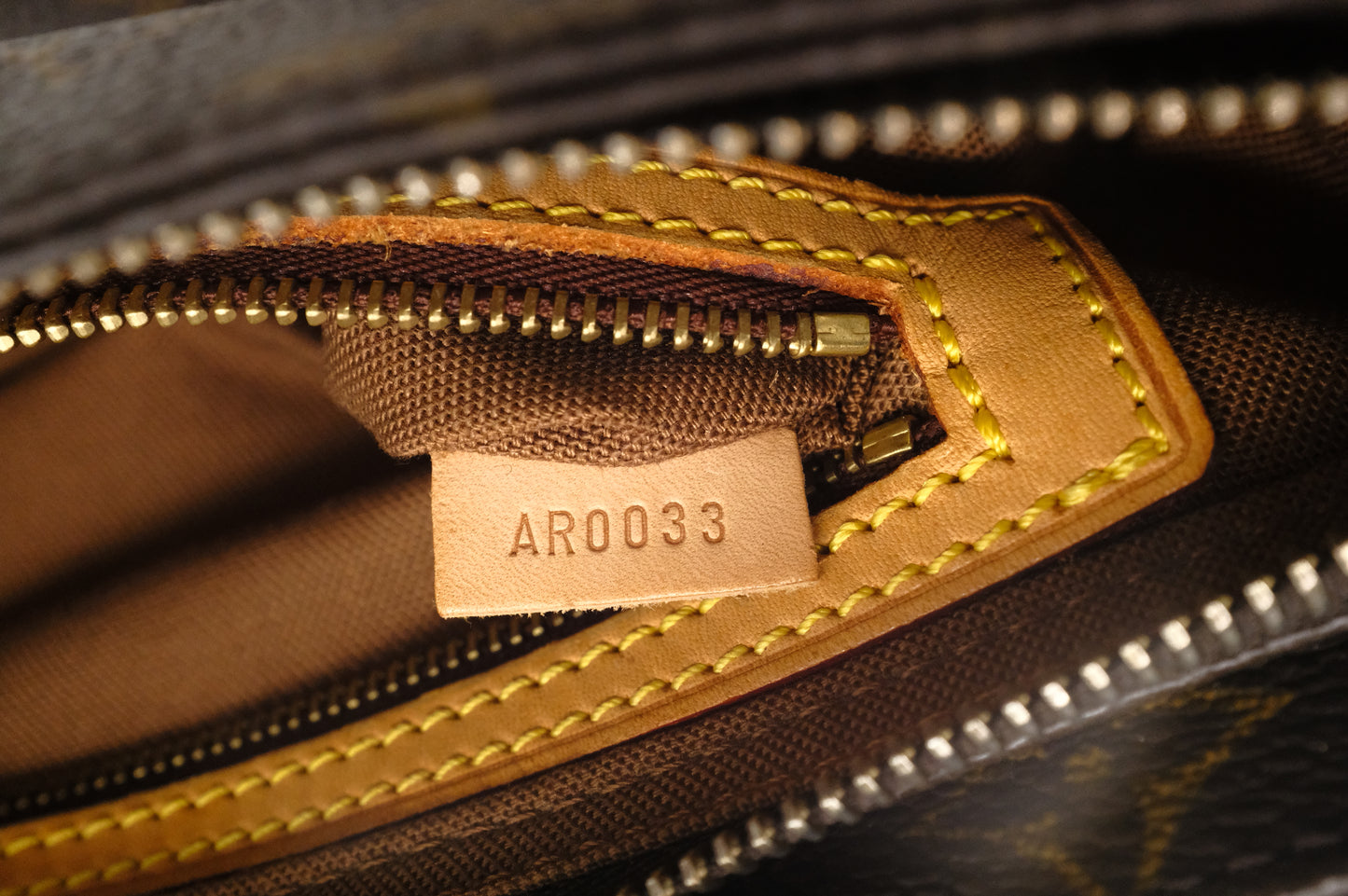 Louis Vuitton Trotteur in Monogram Canvas