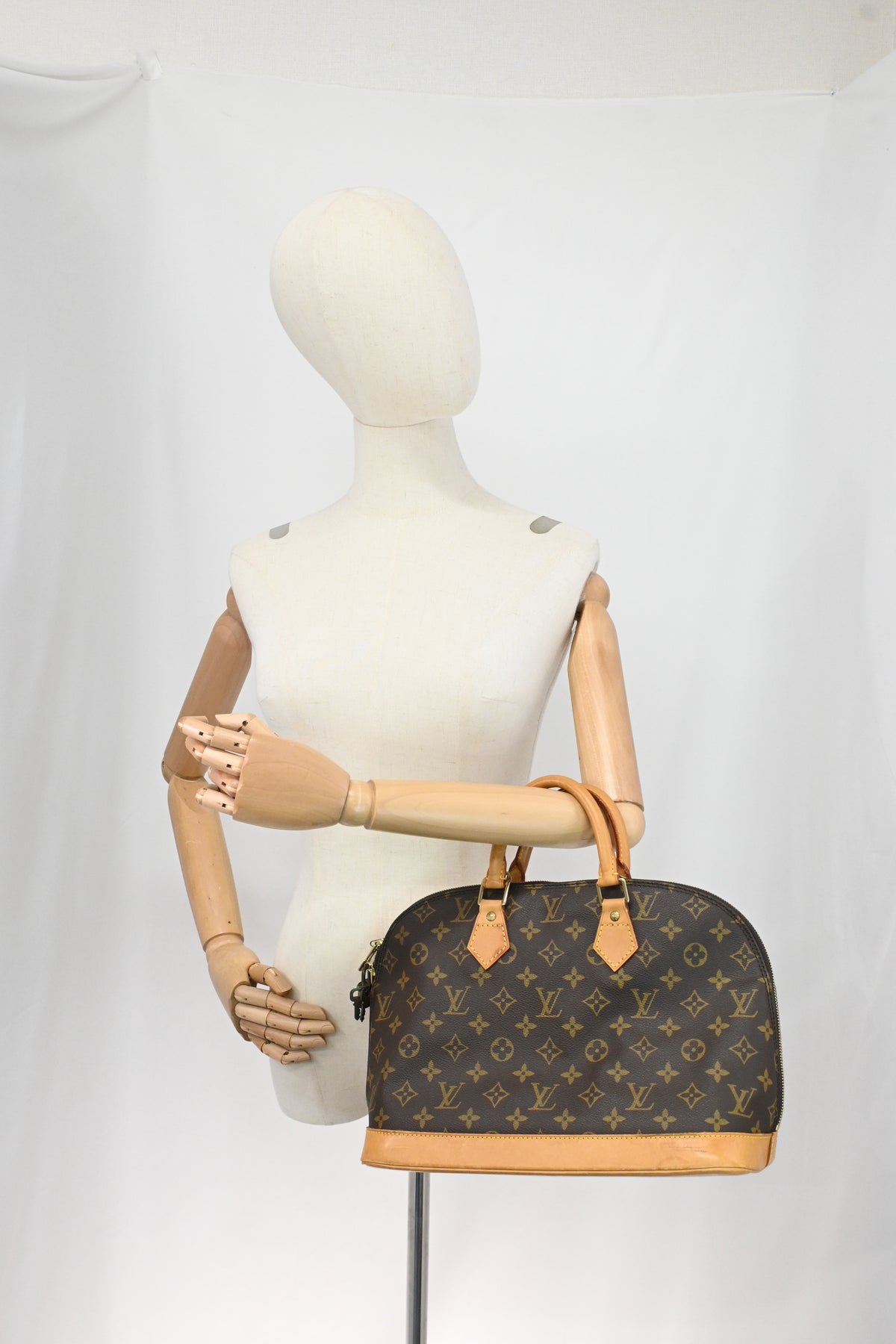 Louis Vuitton Alma PM in Monogram Canvas
