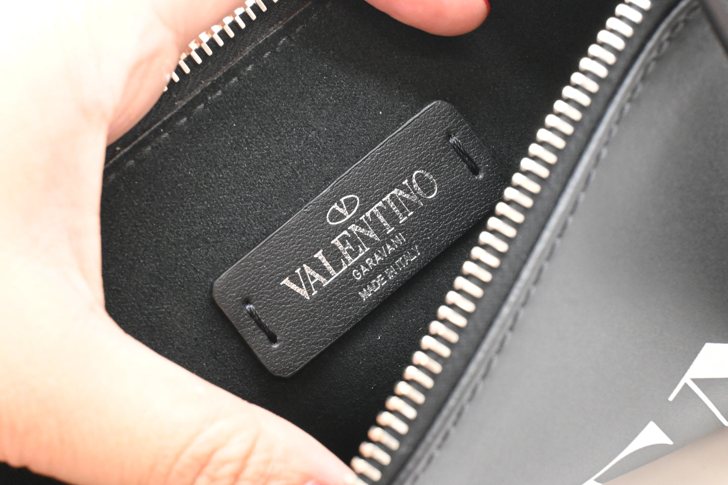 Valentino Clutches in Clean PVC and Black Leather