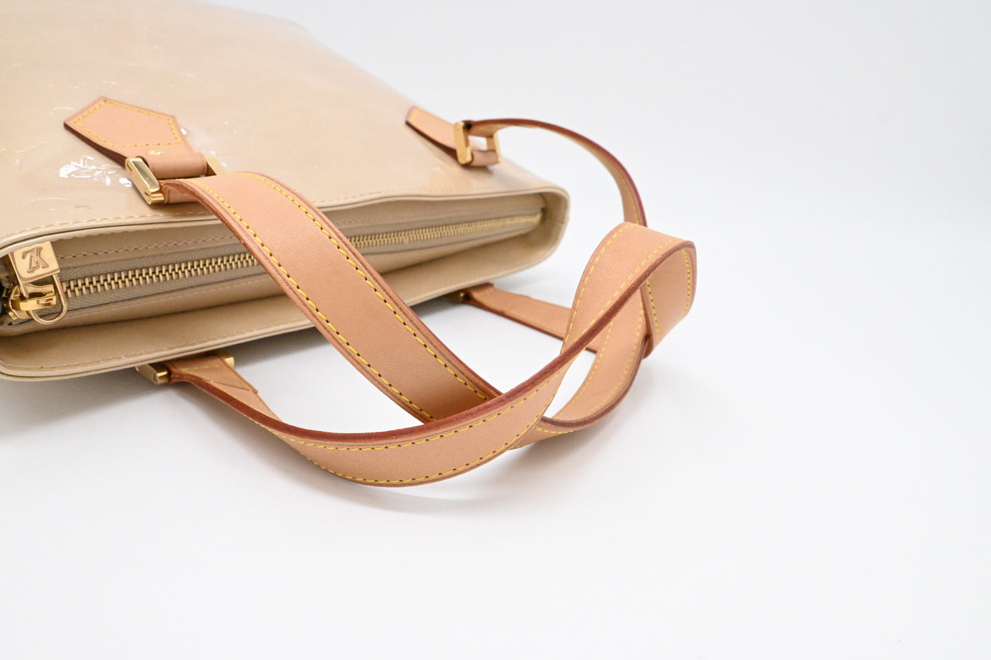 Louis Vuitton Houston in Dune Vernis Leather
