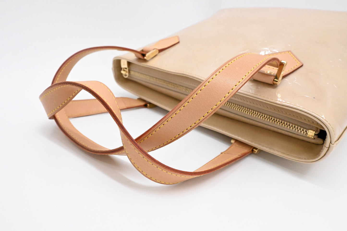 Louis Vuitton Houston in Dune Vernis Leather