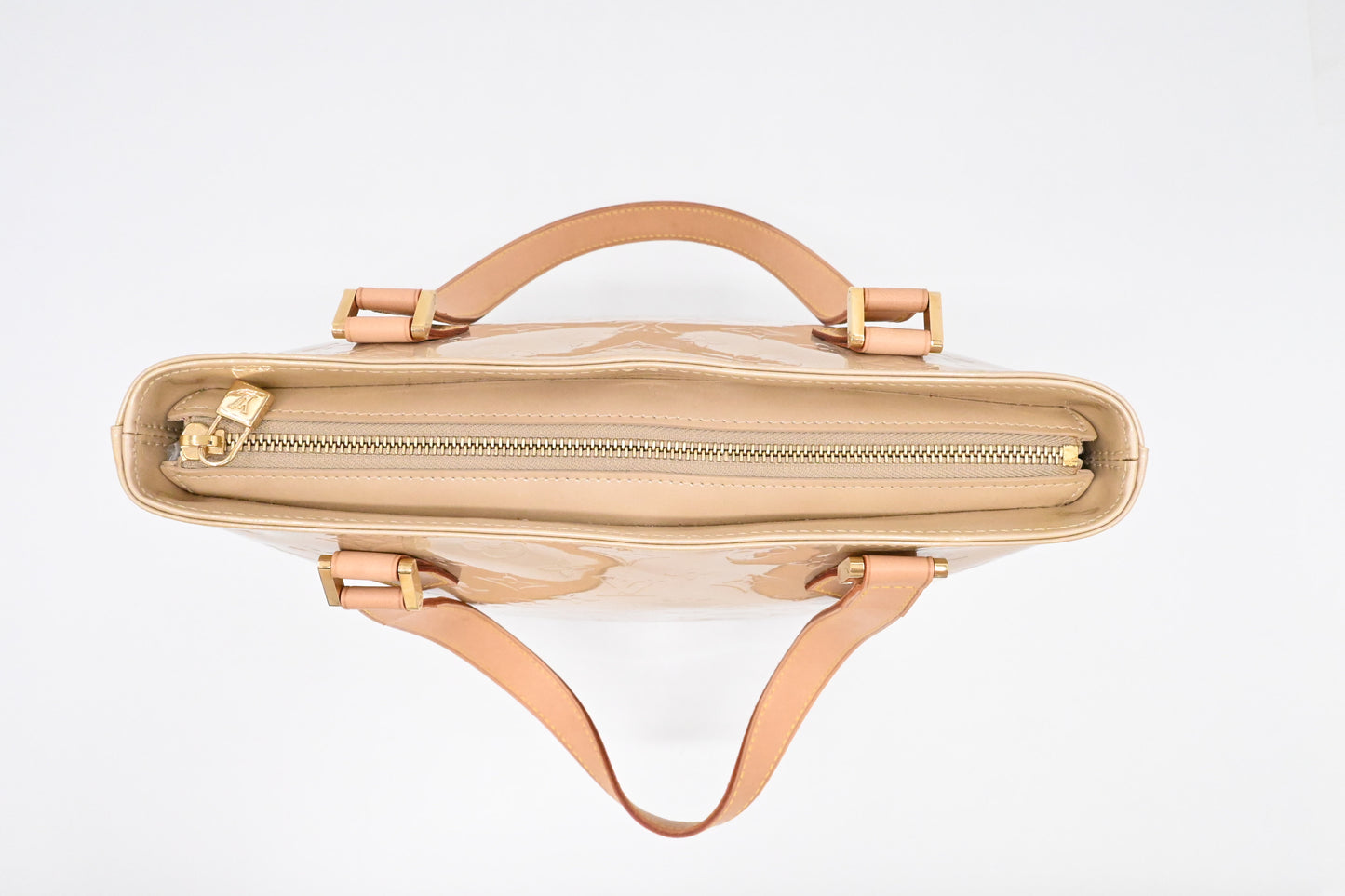 Louis Vuitton Houston in Dune Vernis Leather