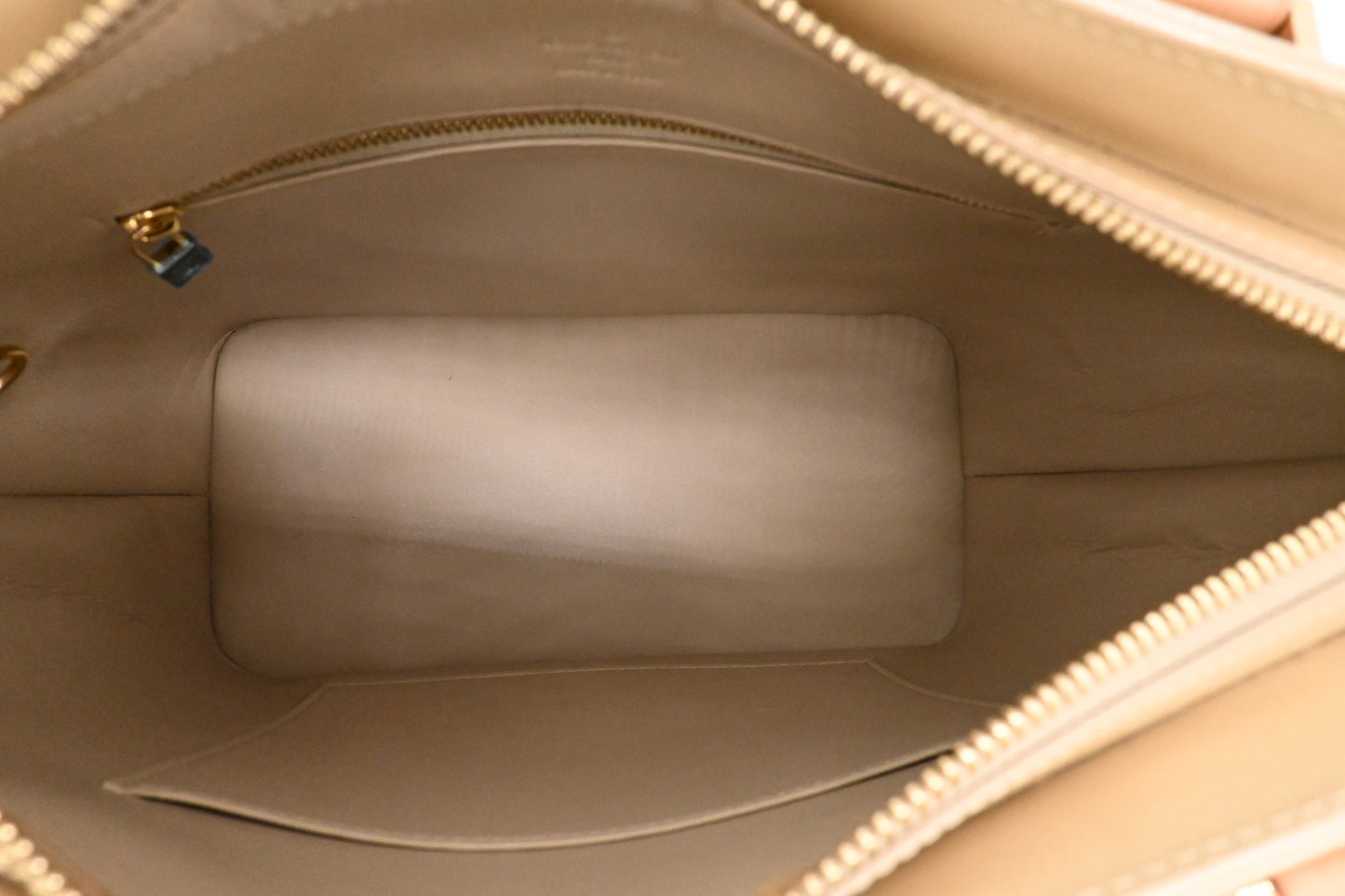 Louis Vuitton Houston in Dune Vernis Leather