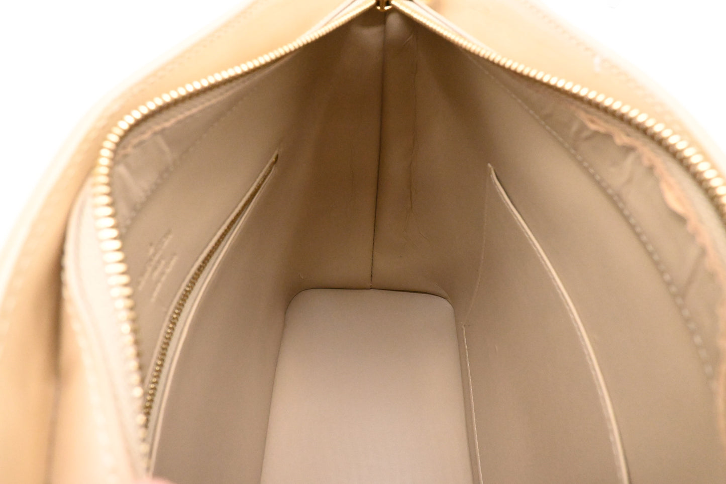 Louis Vuitton Houston in Dune Vernis Leather