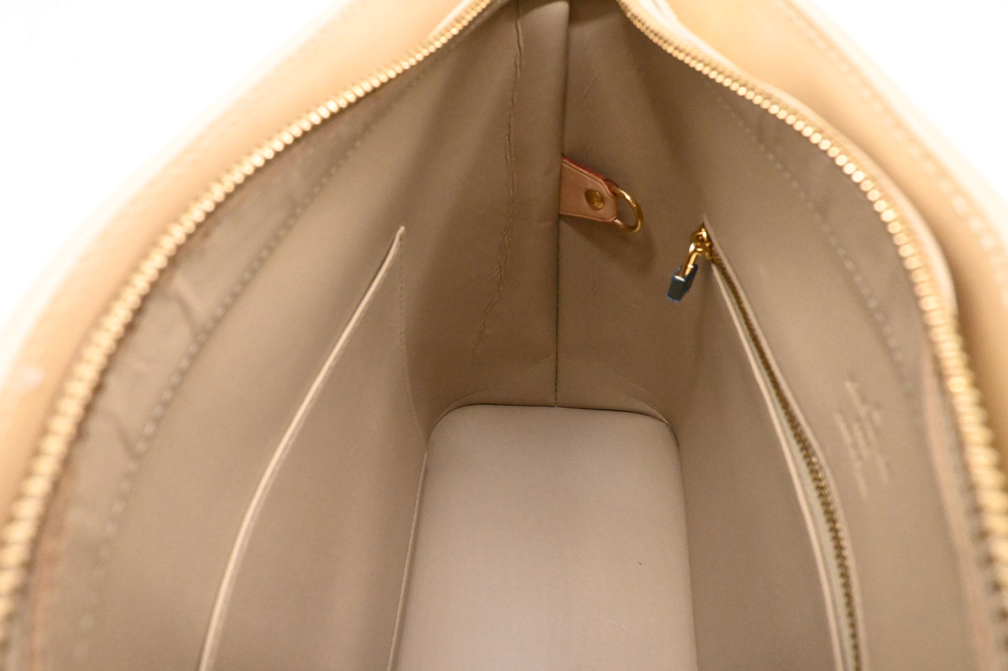 Louis Vuitton Houston in Dune Vernis Leather