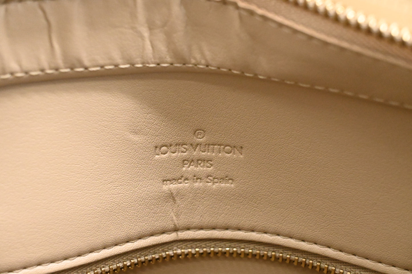 Louis Vuitton Houston in Dune Vernis Leather