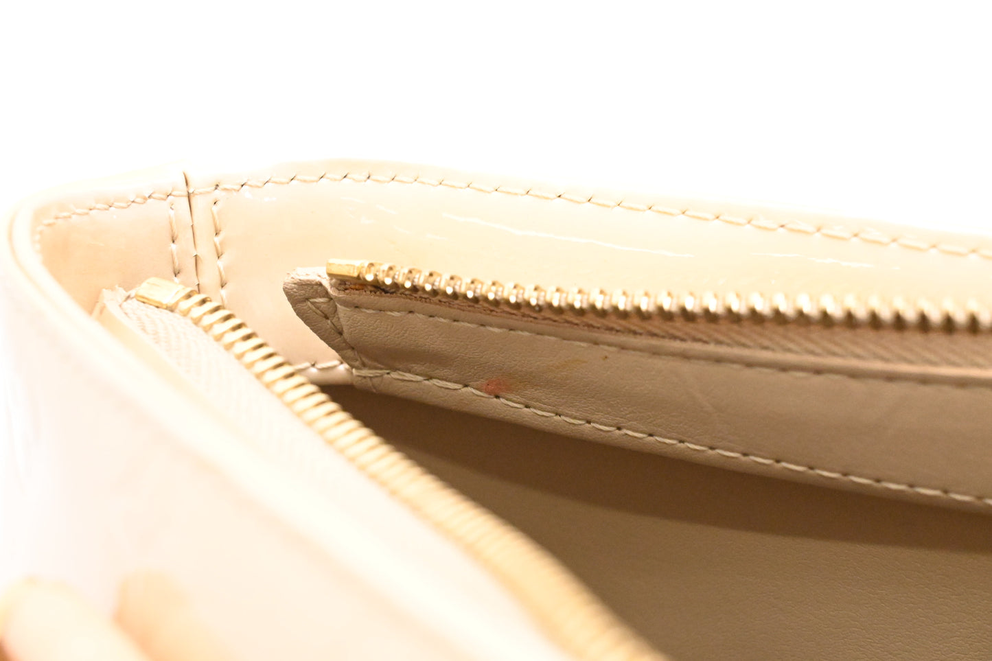 Louis Vuitton Houston in Dune Vernis Leather