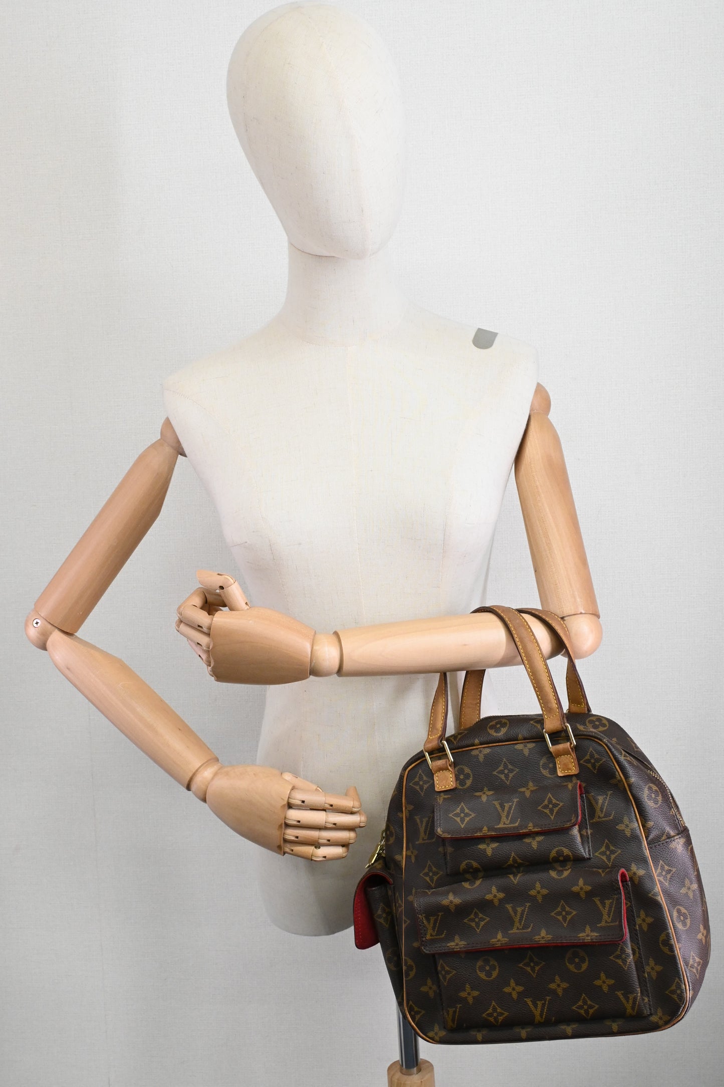 Louis Vuitton Excentri Cite in Monogram Canvas