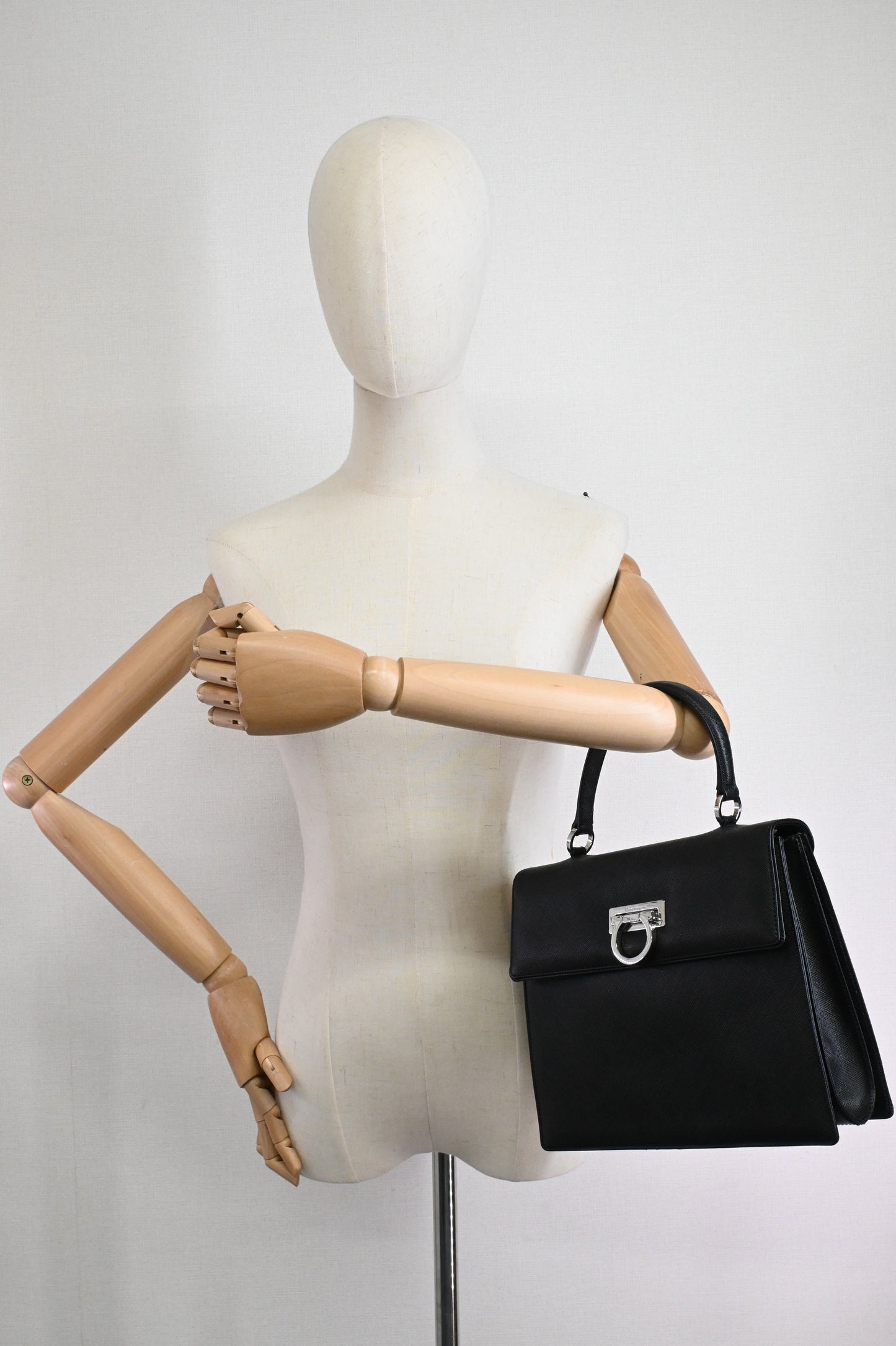 Ferragamo Gancini Handbag in Black Leather