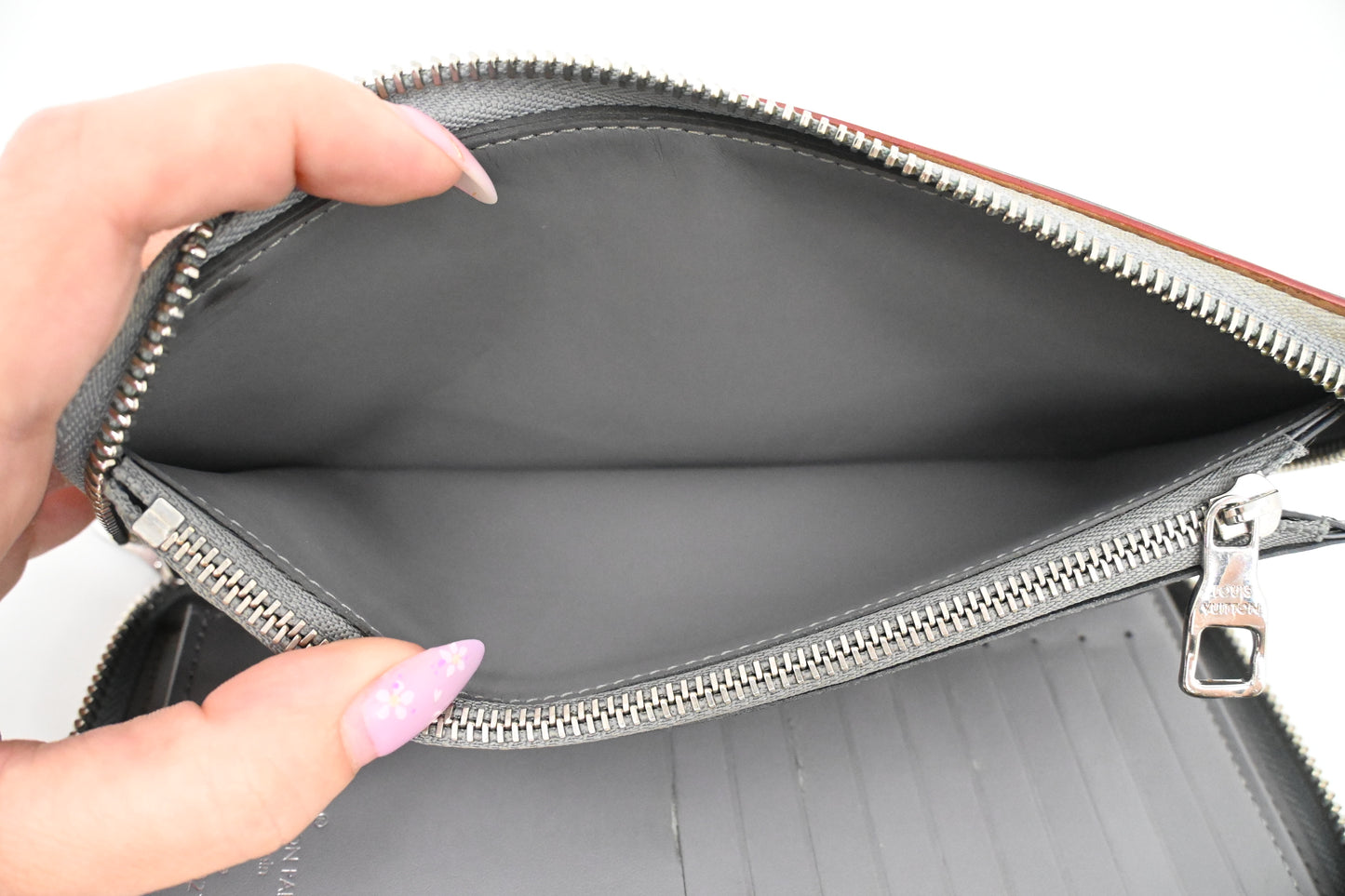 Louis Vuitton Vertical Zippy Wallet in Silver Mirror Canvas