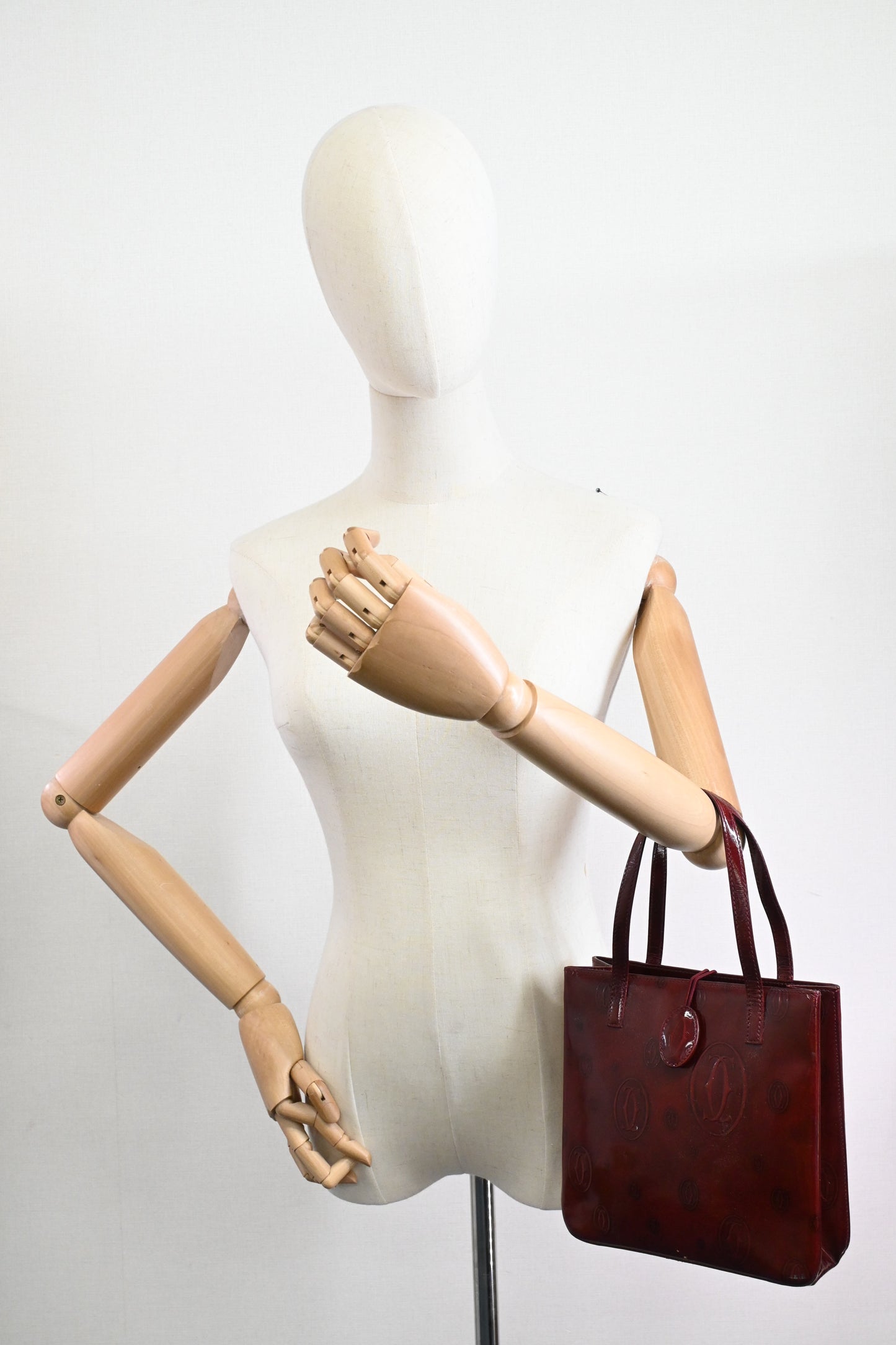 Cartier Handbag in Burgundy Patent Leather