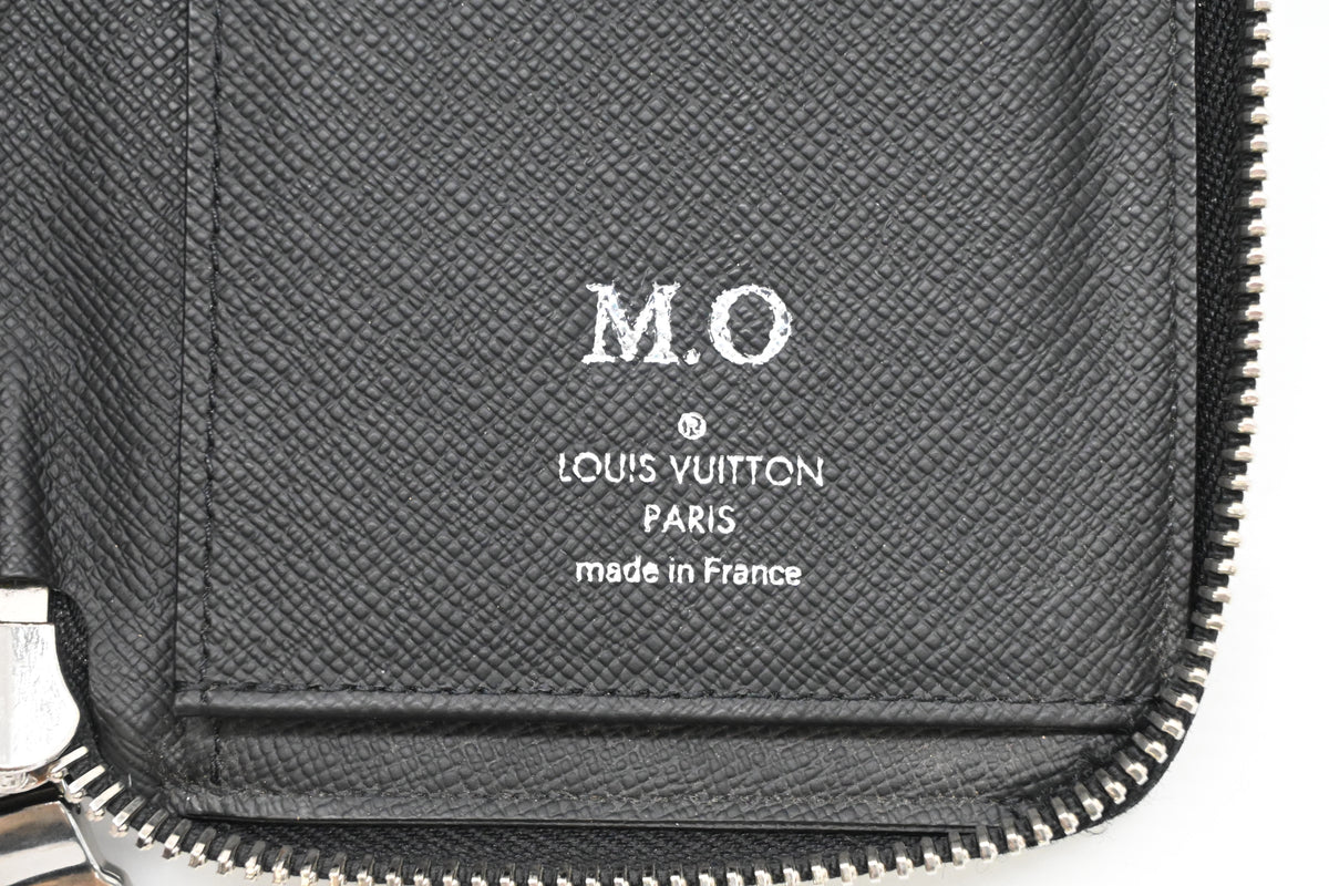 Louis Vuitton Long Zippy Wallet in Black Taiga Leather
