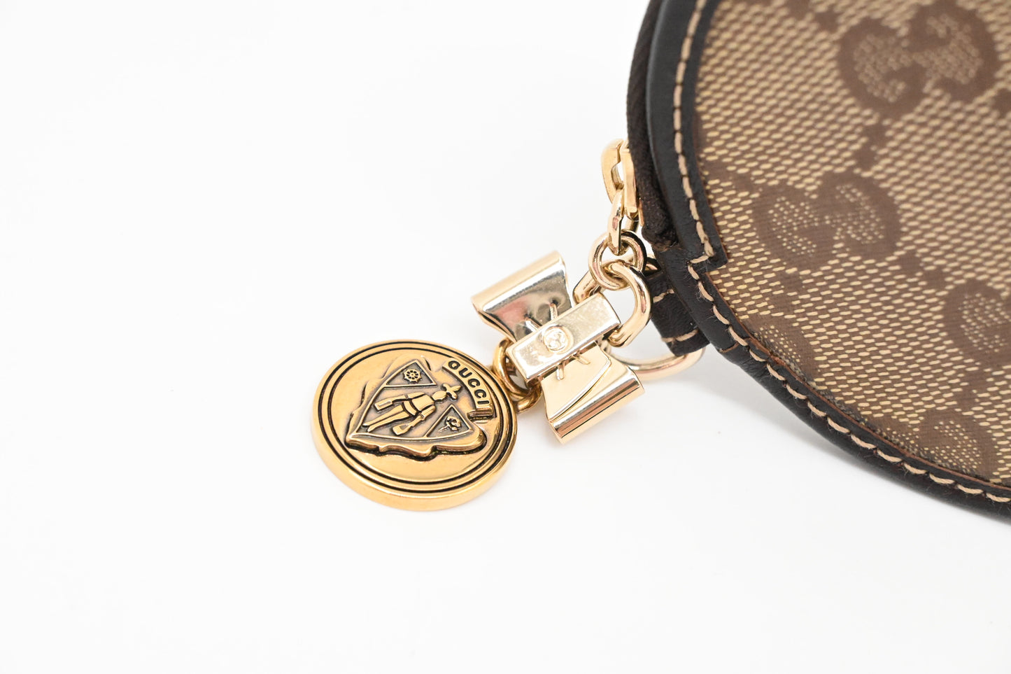Gucci Round Coin Case in GG Coated Canvas