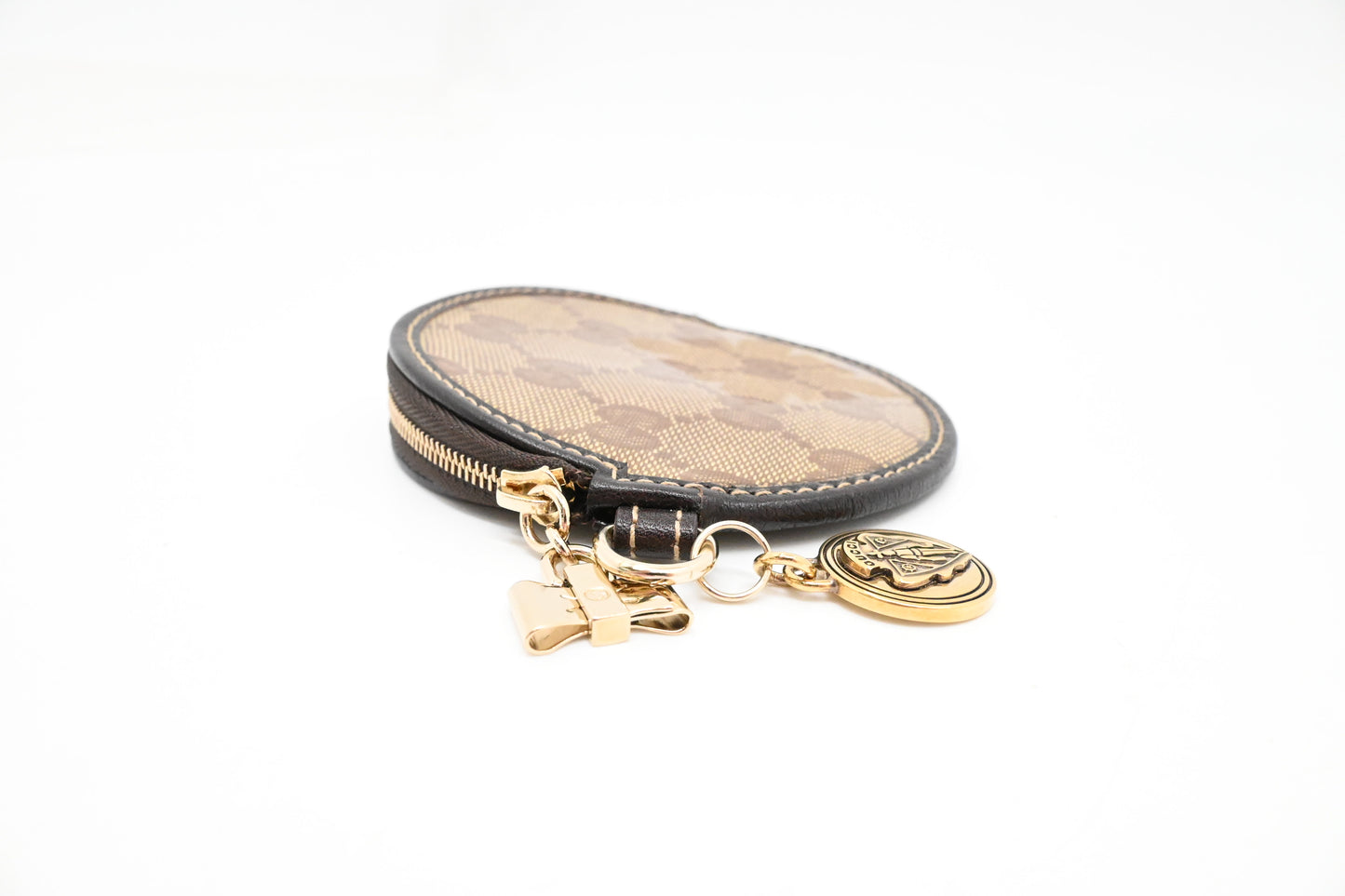 Gucci Round Coin Case in GG Coated Canvas