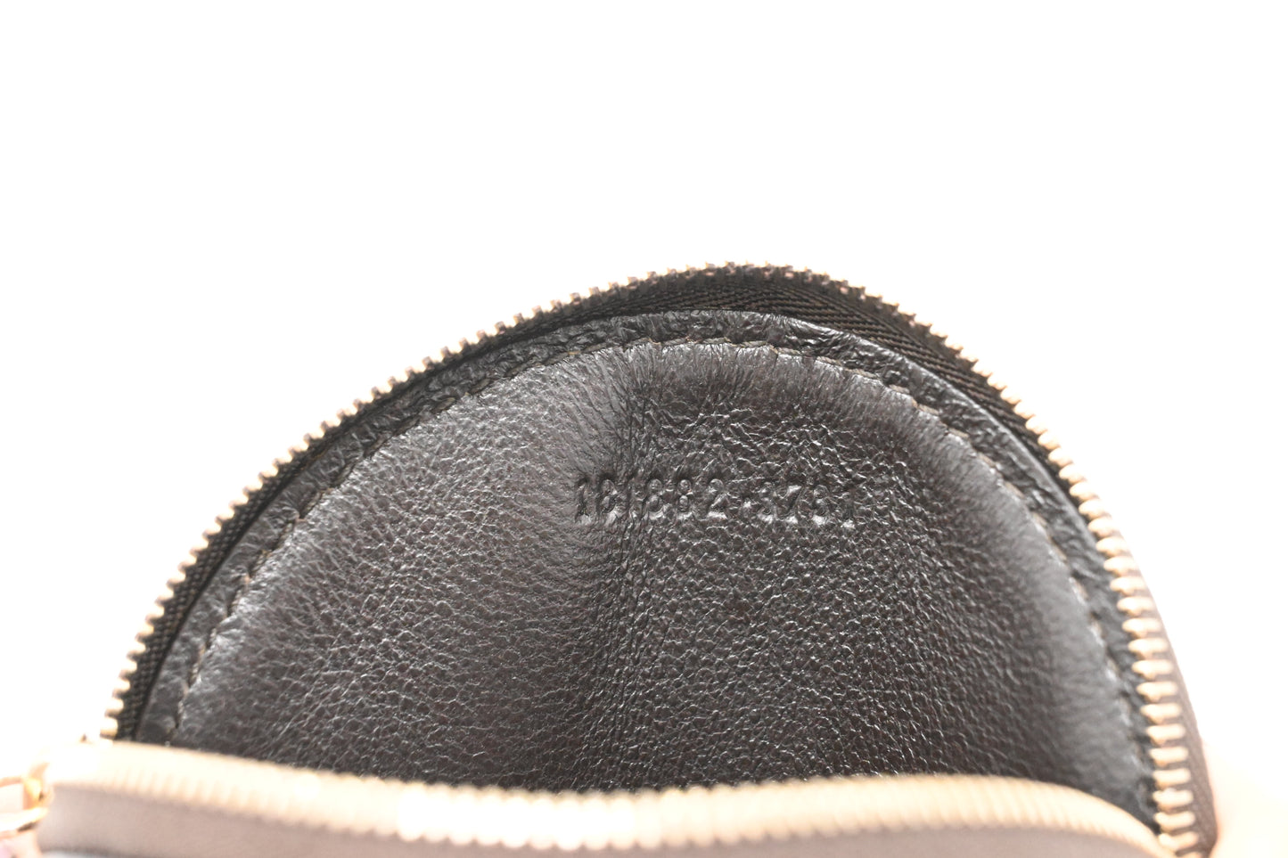 Gucci Round Coin Case in GG Coated Canvas