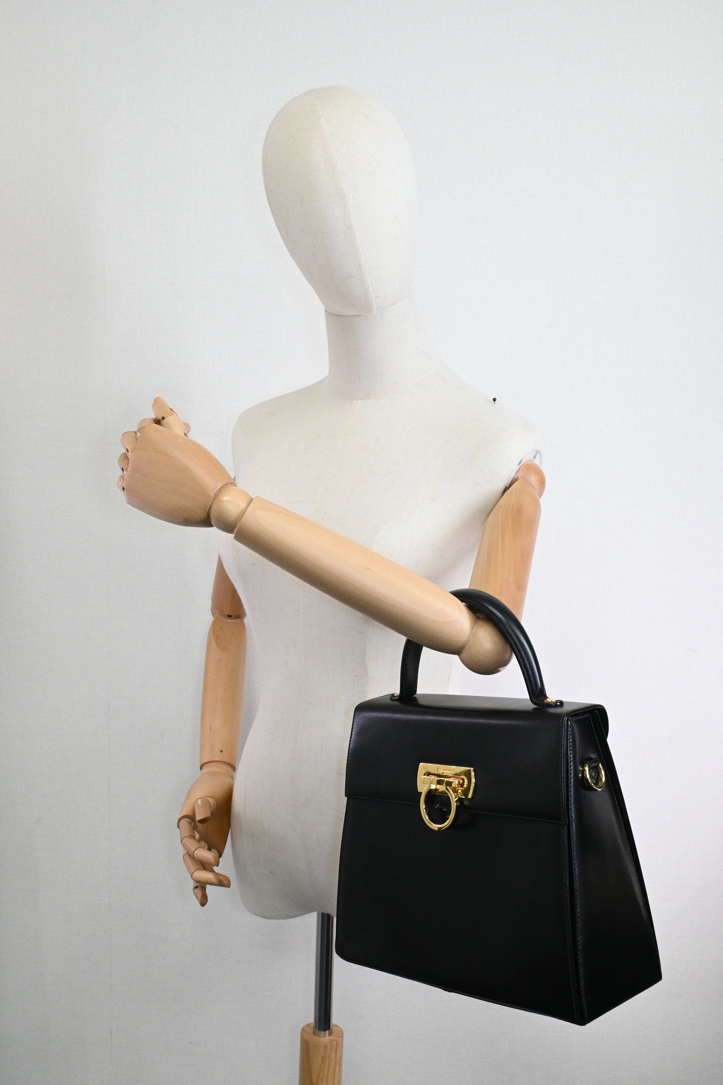 Ferragamo Gancini Handbag in Black Leather