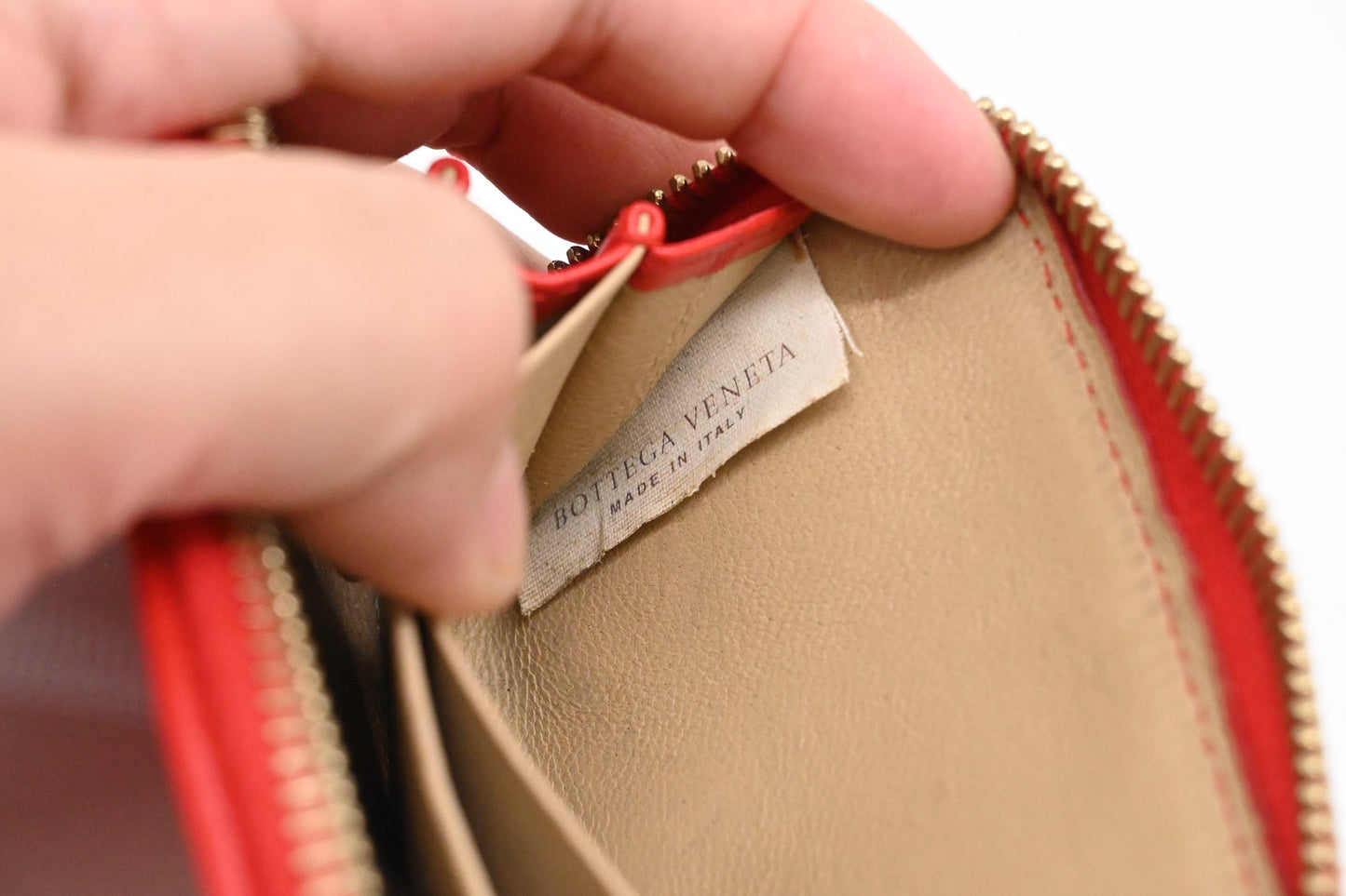 Bottega Veneta Compact Zippy in Red Intrecciato Leather