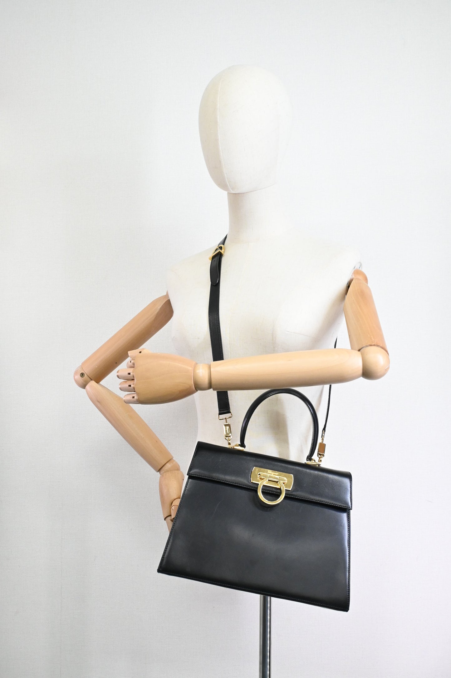 Ferragamo Gancini Two Way Handbag in Black Leather