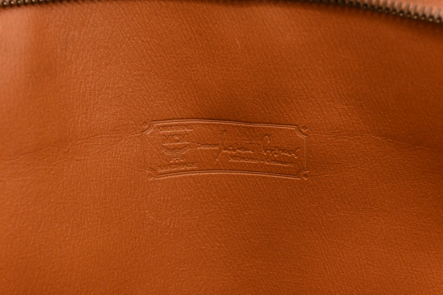 MCM Clutch Bag in Cognac Visetos Canvas