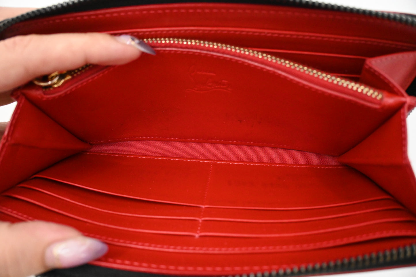 Louboutin Zippy Wallet in Black Spiked Leather