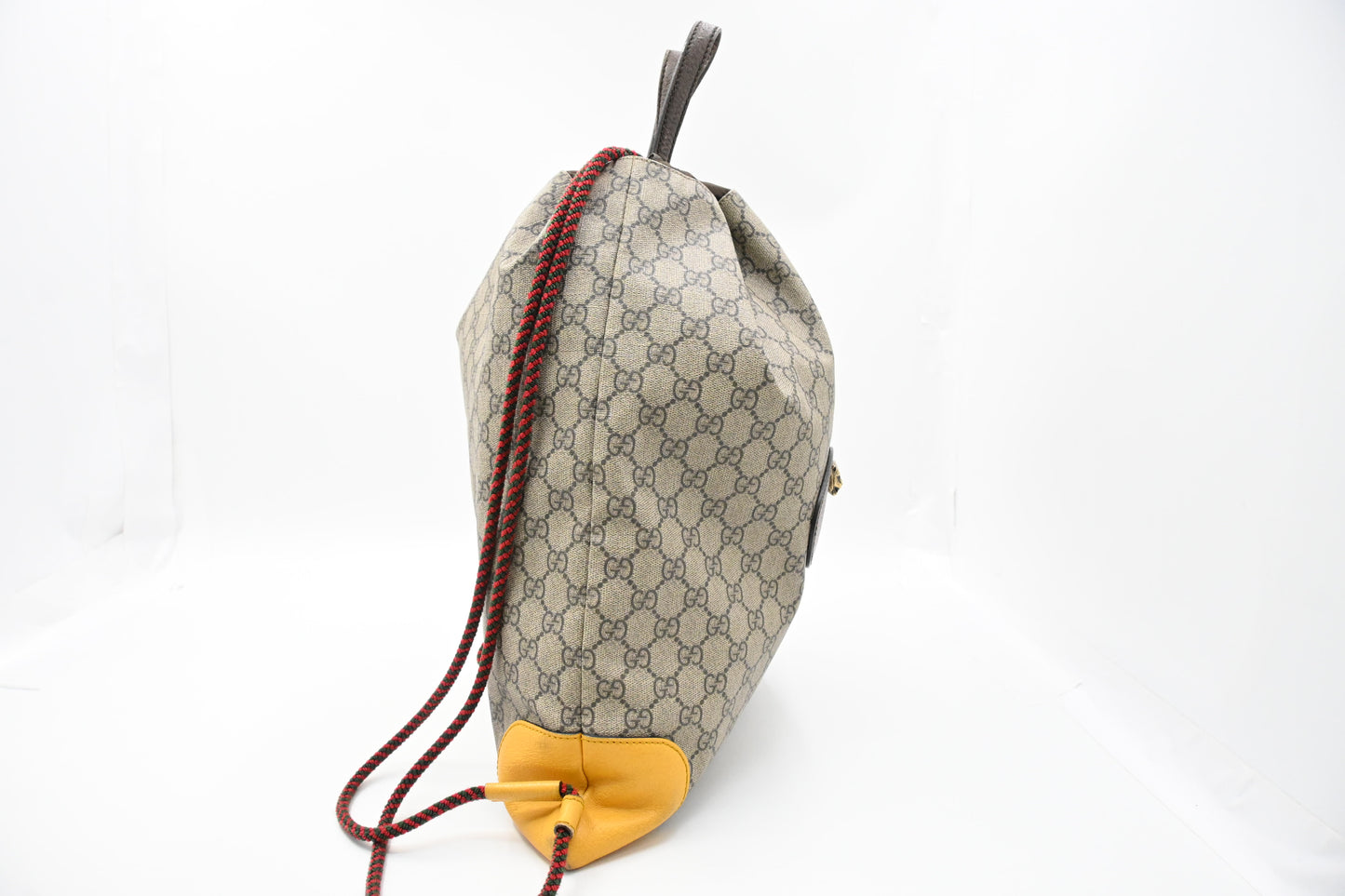 Gucci Tiger Drawstring Backpack in GG Supreme Canvas