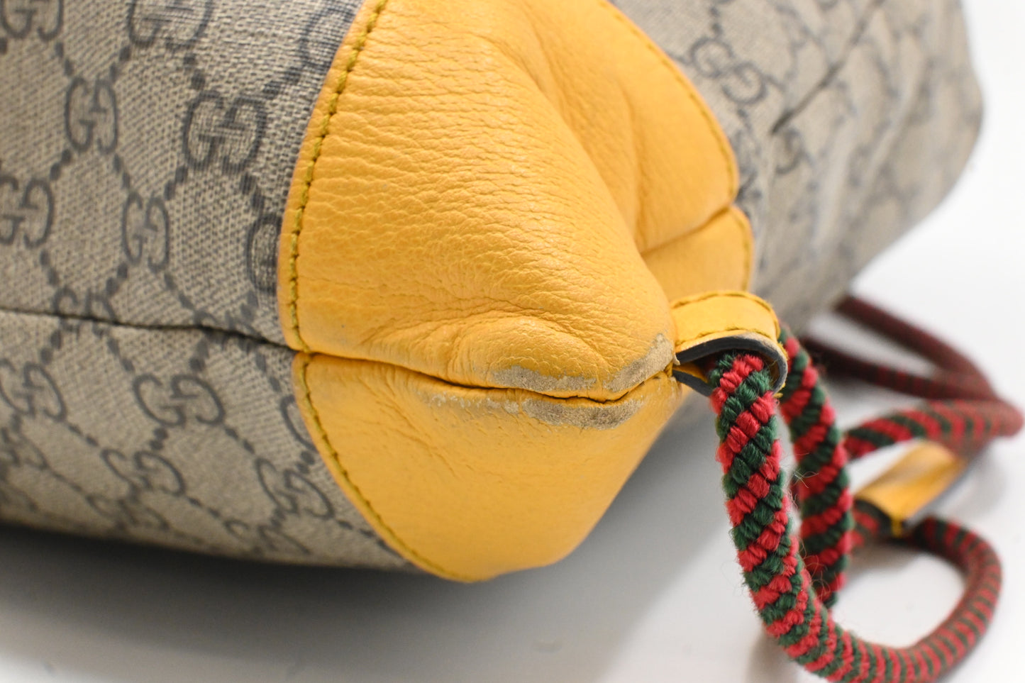 Gucci Tiger Drawstring Backpack in GG Supreme Canvas