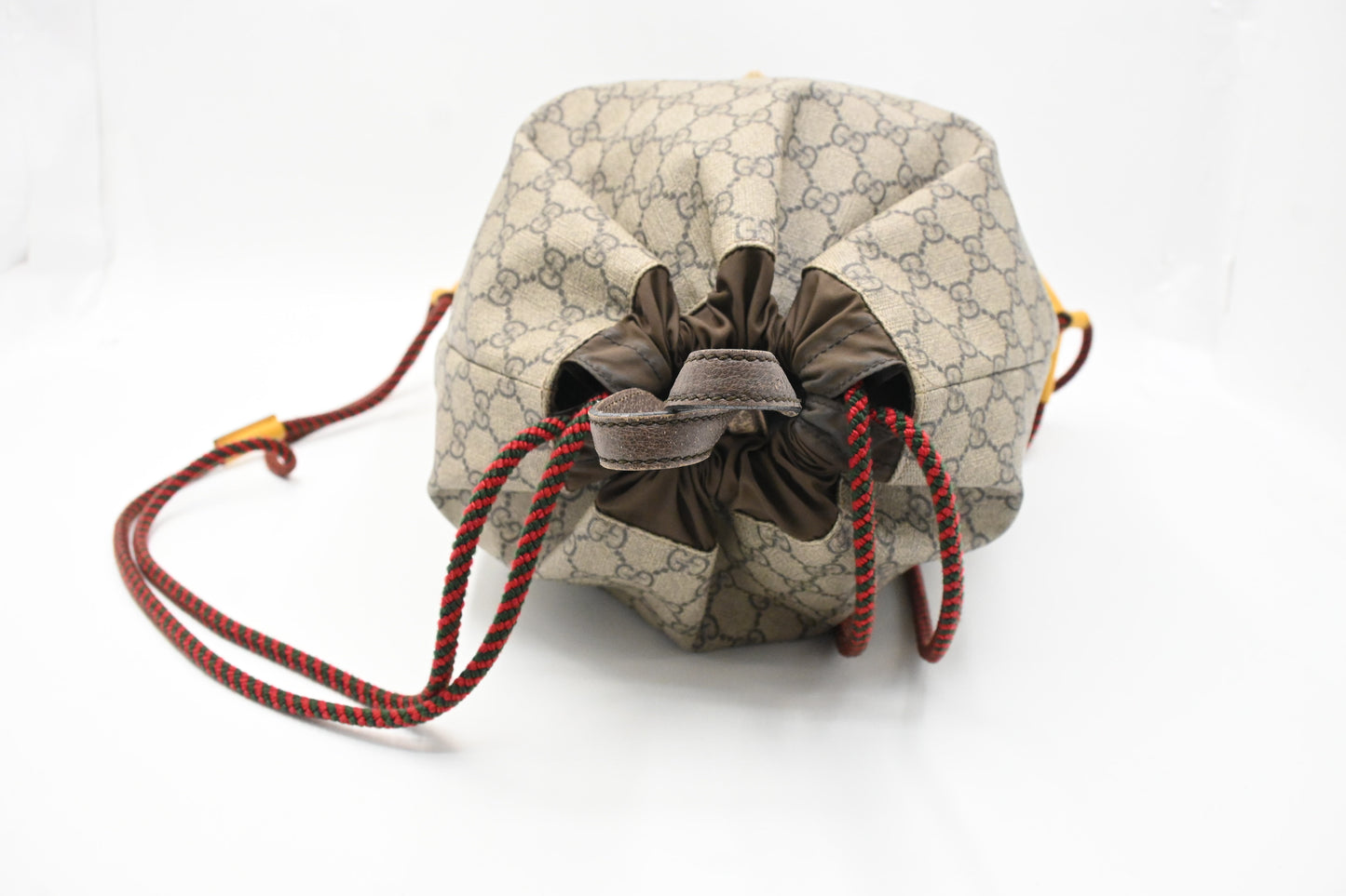 Gucci Tiger Drawstring Backpack in GG Supreme Canvas