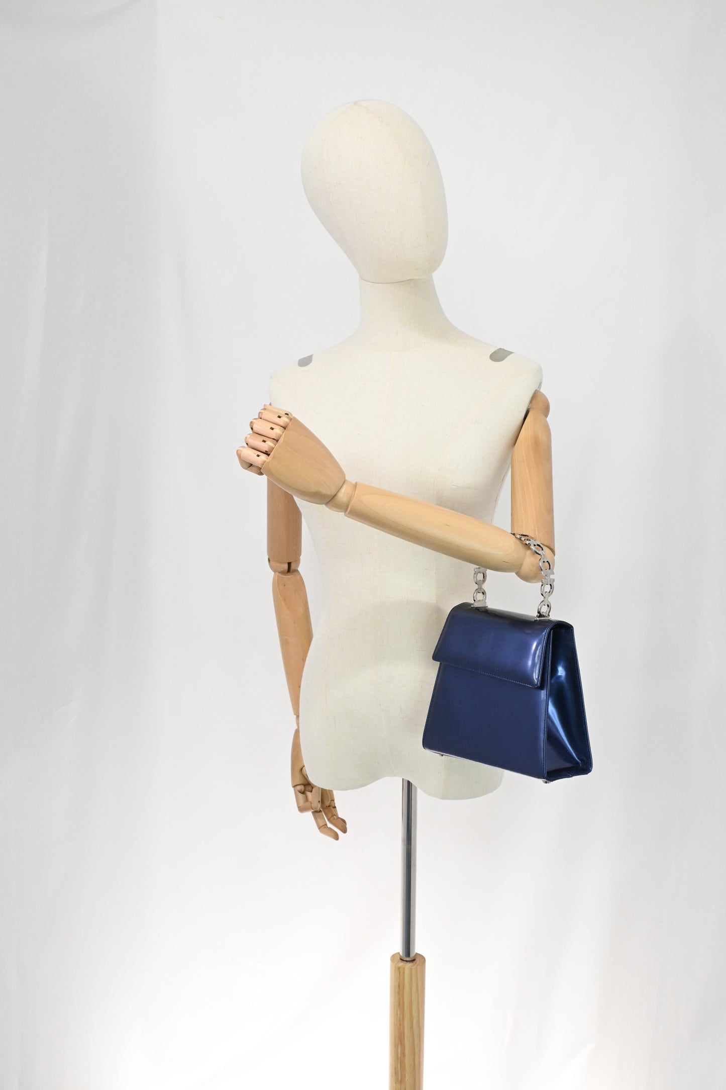 Ferragamo Top Handle Bag in Metallic Blue Patent Leather