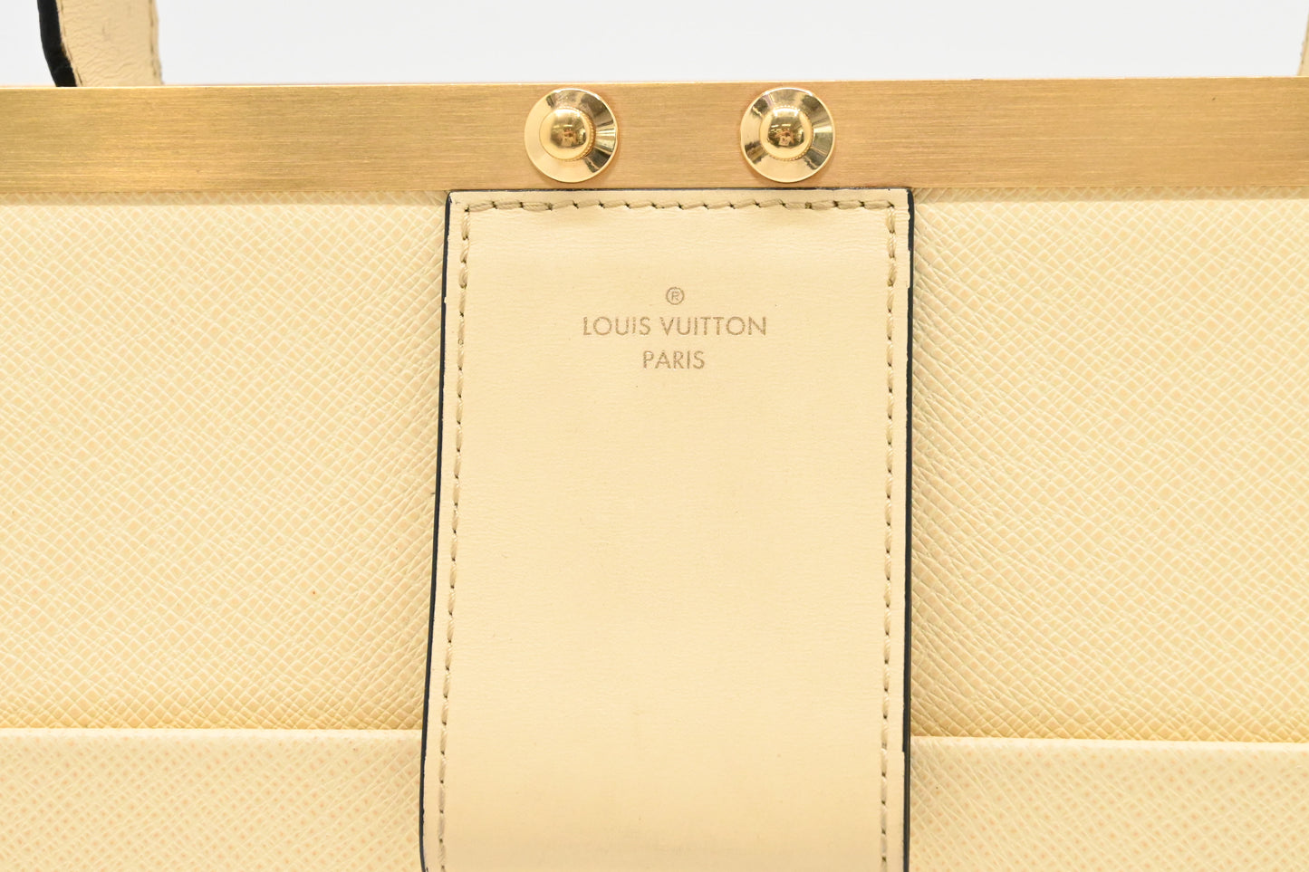 Louis Vuitton City Frame in Banane Taiga Leather