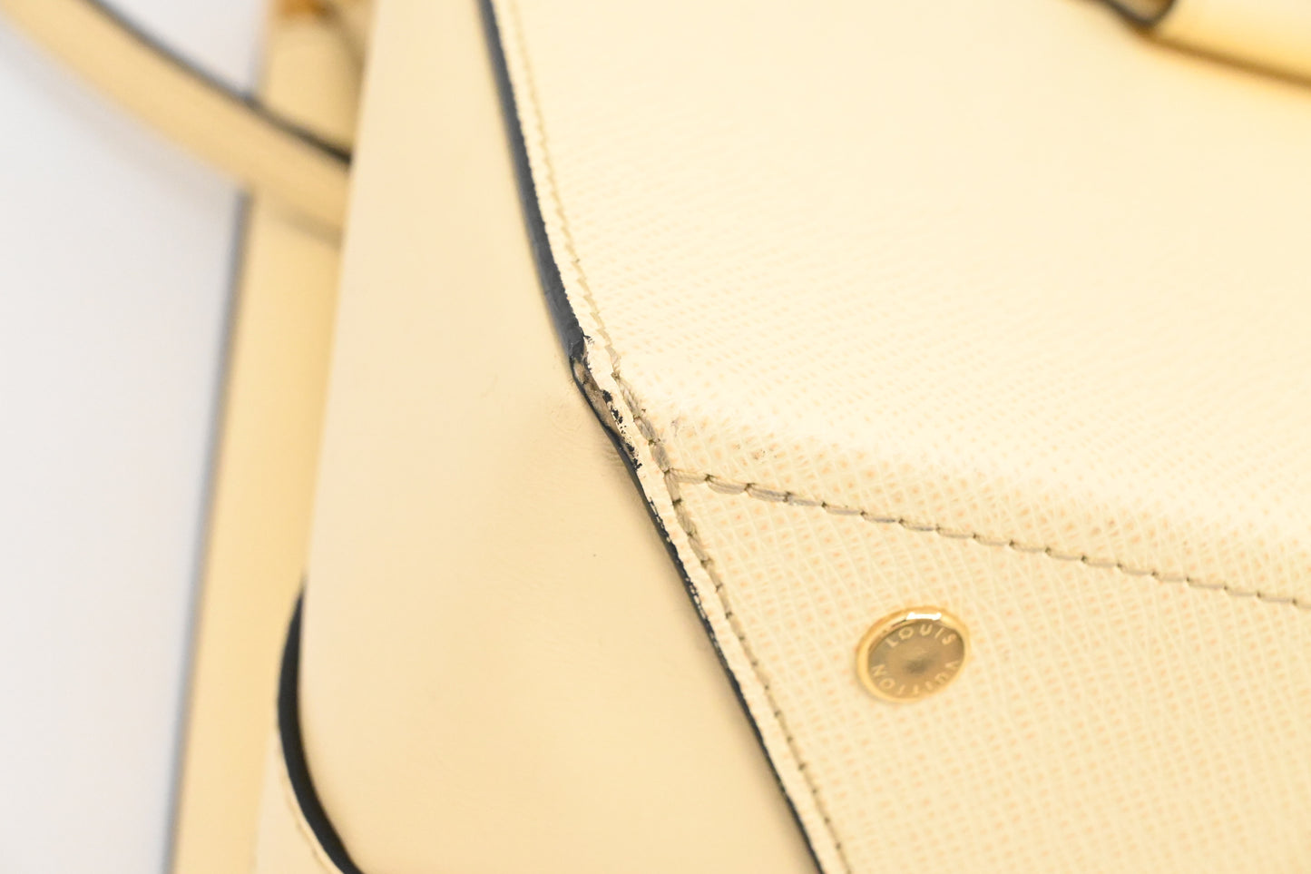Louis Vuitton City Frame in Banane Taiga Leather