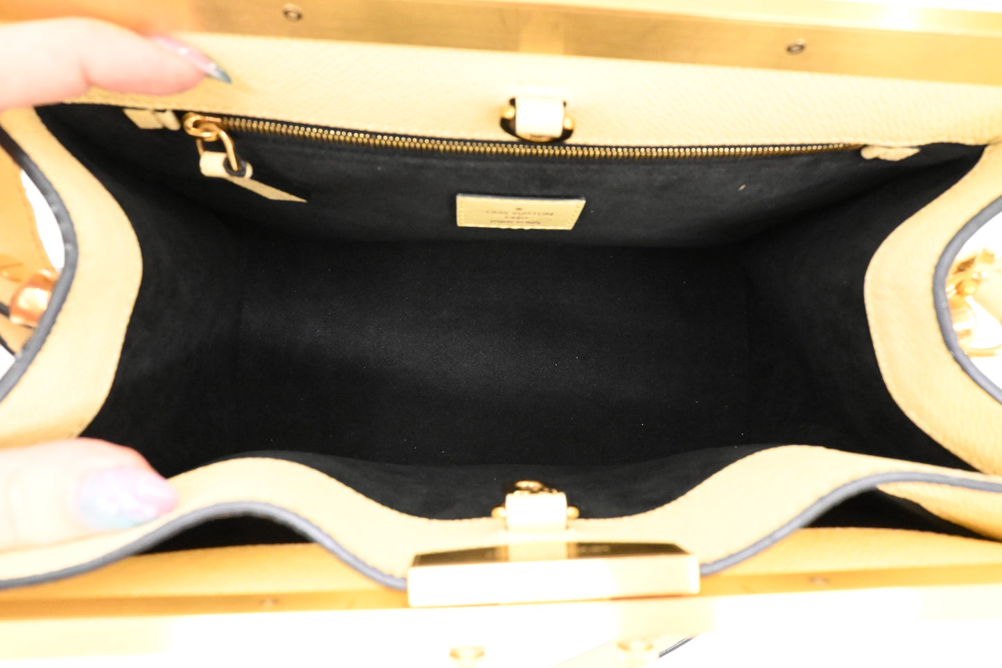 Louis Vuitton City Frame in Banane Taiga Leather