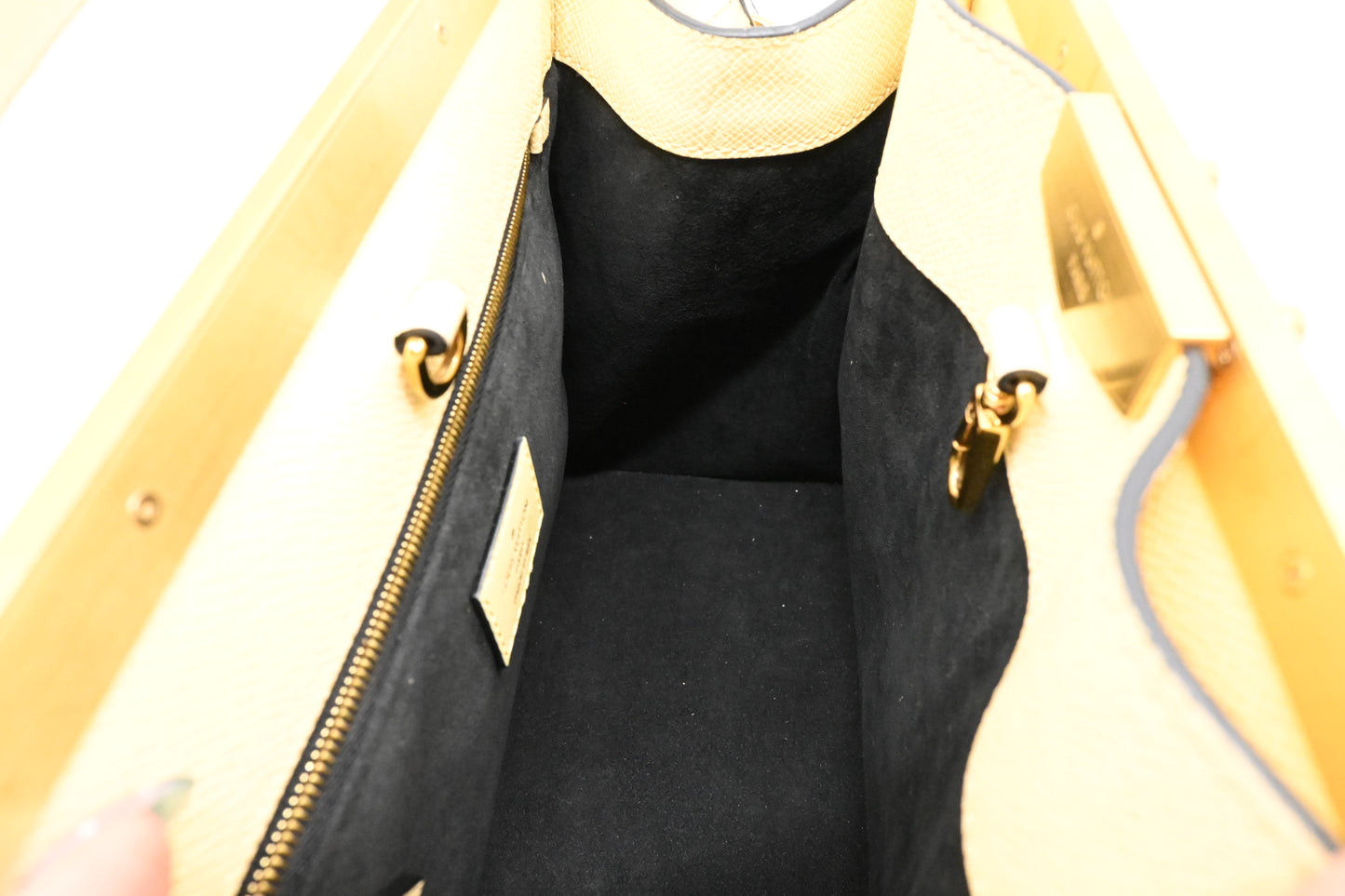 Louis Vuitton City Frame in Banane Taiga Leather