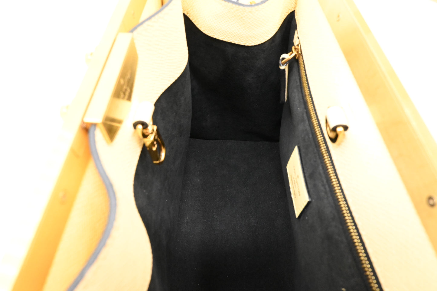 Louis Vuitton City Frame in Banane Taiga Leather