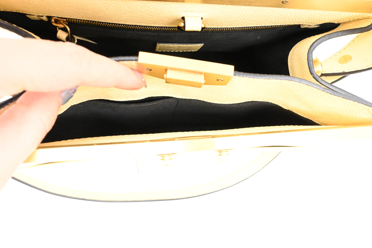 Louis Vuitton City Frame in Banane Taiga Leather